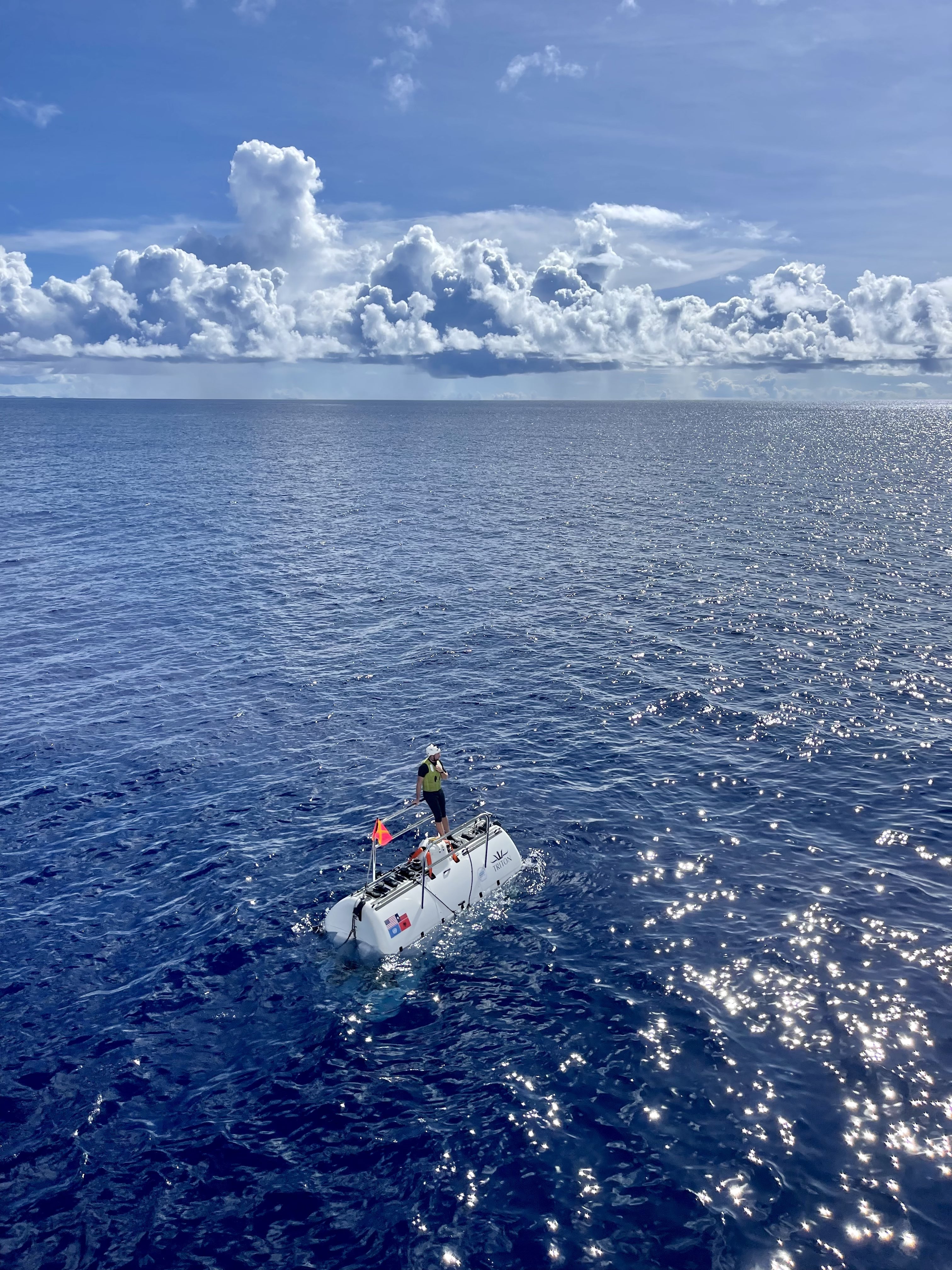 The Limiting Factor with former Palau President Tommy Remengesau Jr.  and Victor Vescovo inside as they surface and return to the ship.