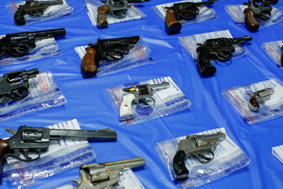 Guns are displayed after a gun buyback event organized by the New York City Police Department in the Queens borough of New York City, June 12, 2021.