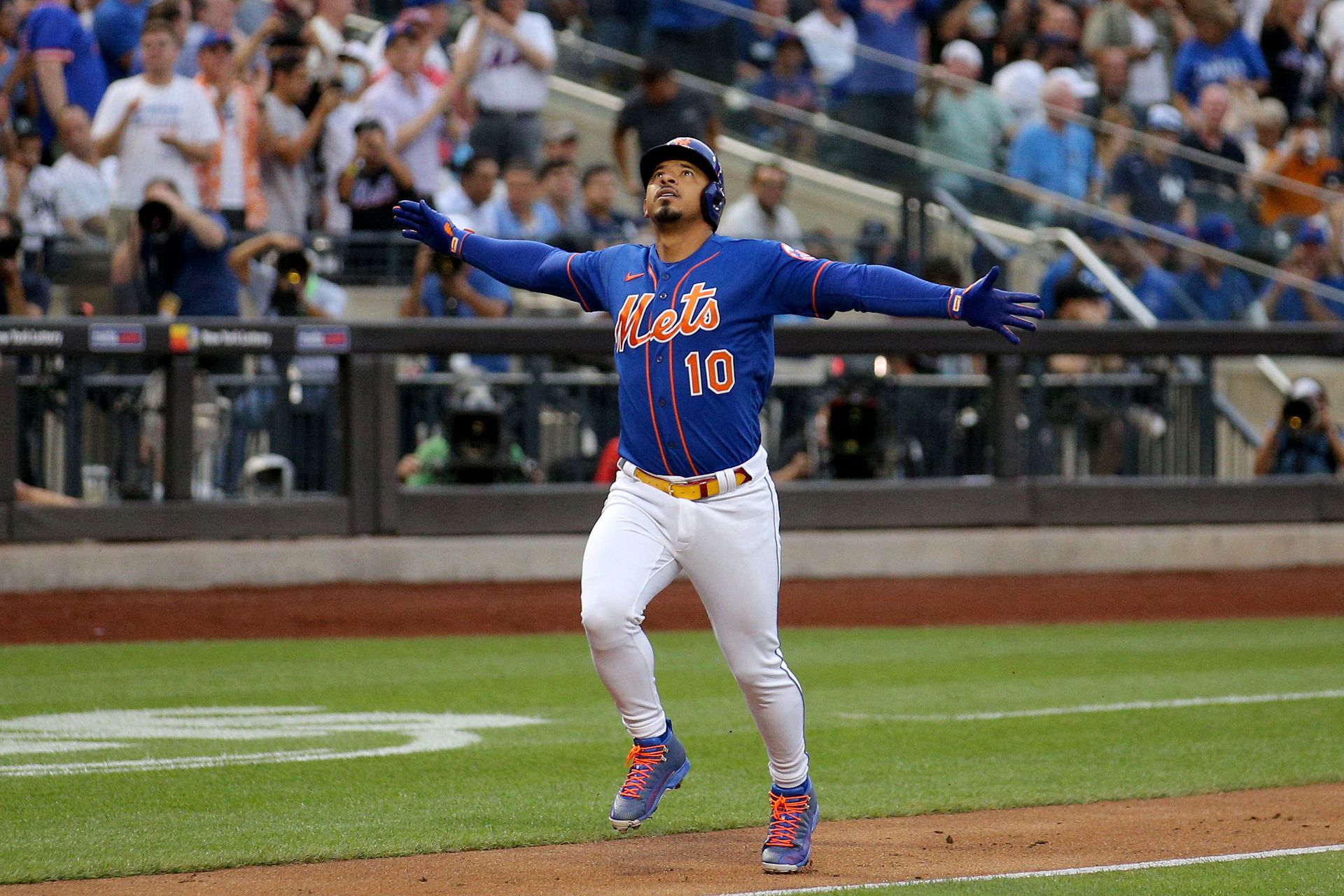 New York Mets third baseman Eduardo Escobar (10) reacts after hitting a two run home run against the New York Yankees during the first inning at Citi Field in New York City on July 26, 2022.