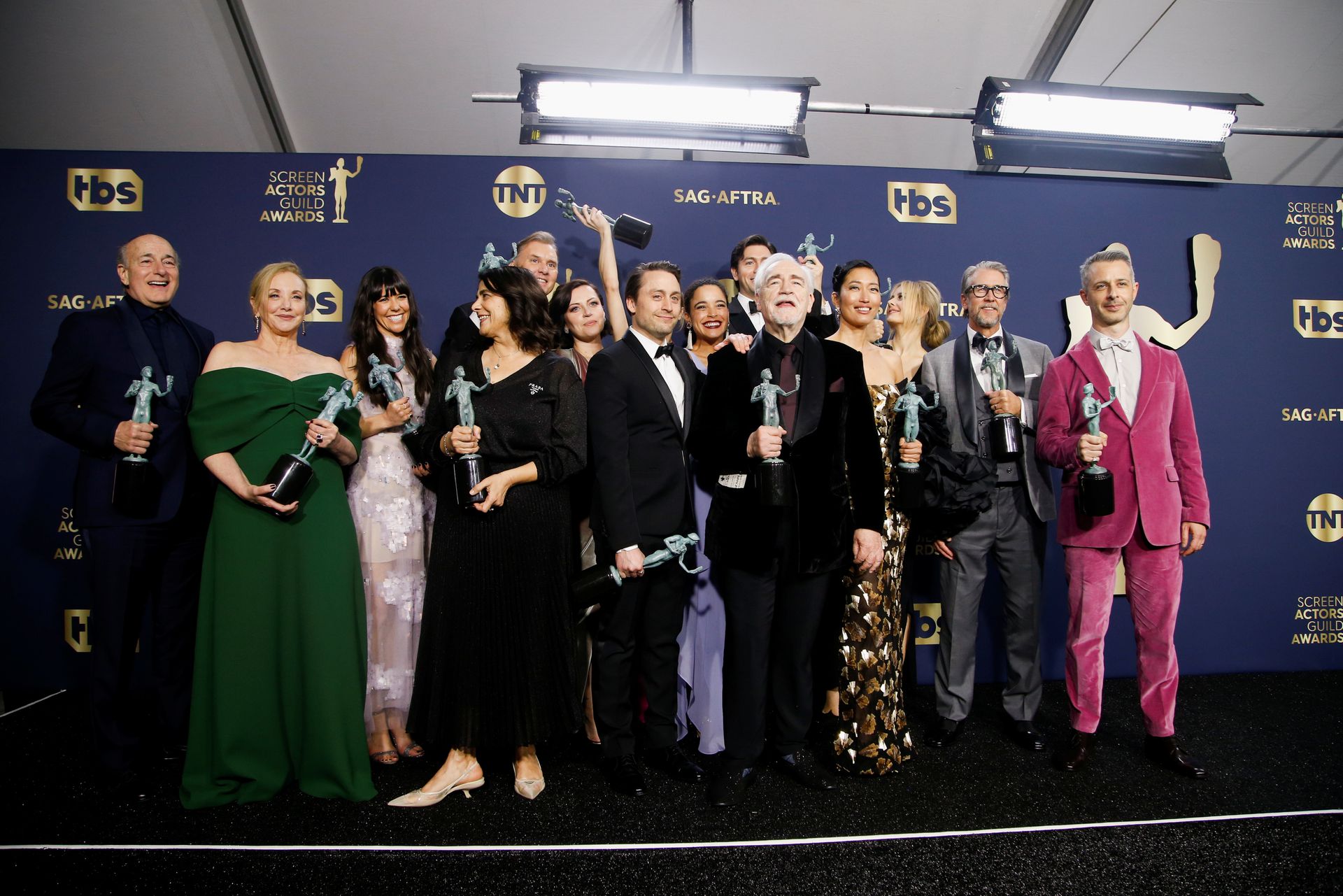 The cast of "Succession" poses backstage with their Outstanding Performance by an Ensemble in a Drama Series at the 28th Screen Actors Guild Awards, in Santa Monica, California, Feb. 27, 2022.