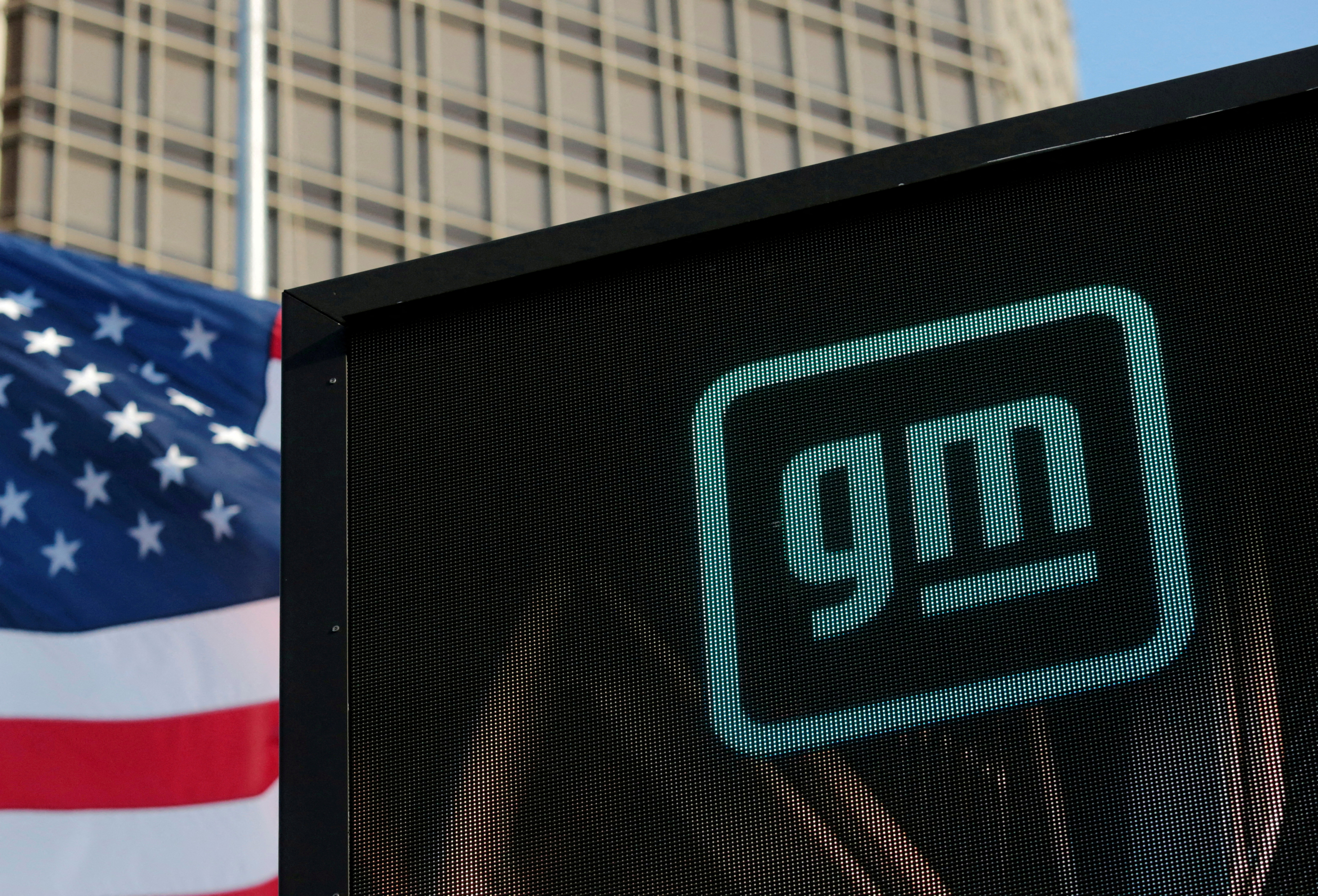 The new GM logo is seen on the facade of the General Motors headquarters in Detroit, Michigan, March 16, 2021.