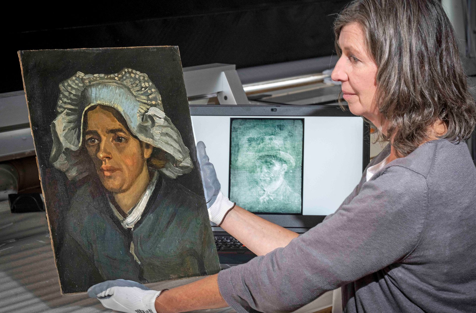 Van Gogh's self-portrait detected under cardboard and glue and “Head of a Peasant Woman” by Vincent Van Gogh are displayed, in Edinburgh, Scotland, Britain, June 21, 2022.