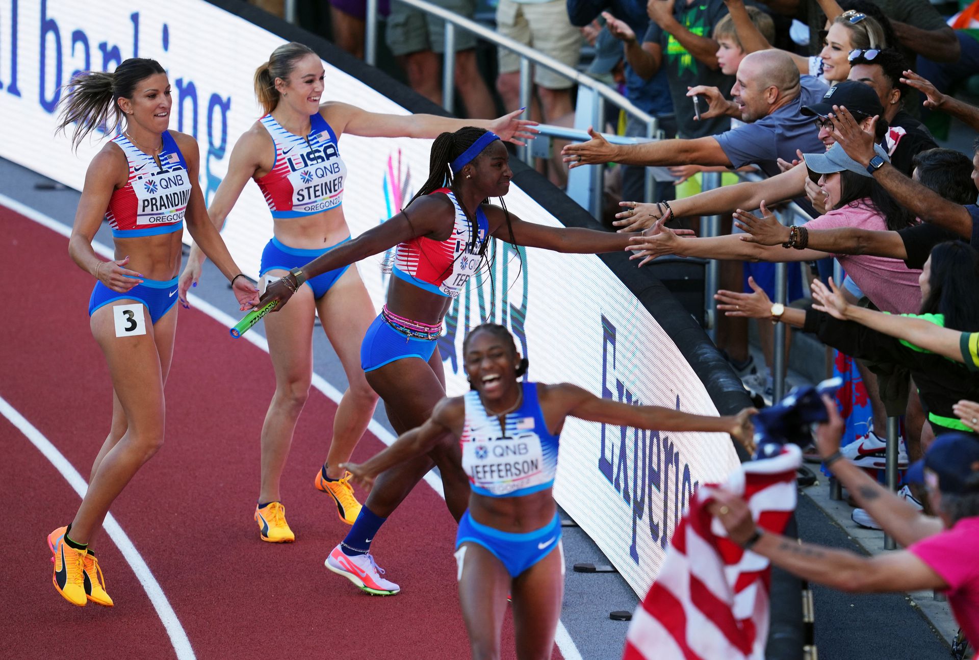 Melissa Jefferson of the U.S. with team mates Abby Steine, Jenna Prandini and Twanisha Terry celebrate after winning the women's 4x100 meters relay final in the World Athletics Championships at the Hayward Field in Eugene, Oregon, July 23, 2022.