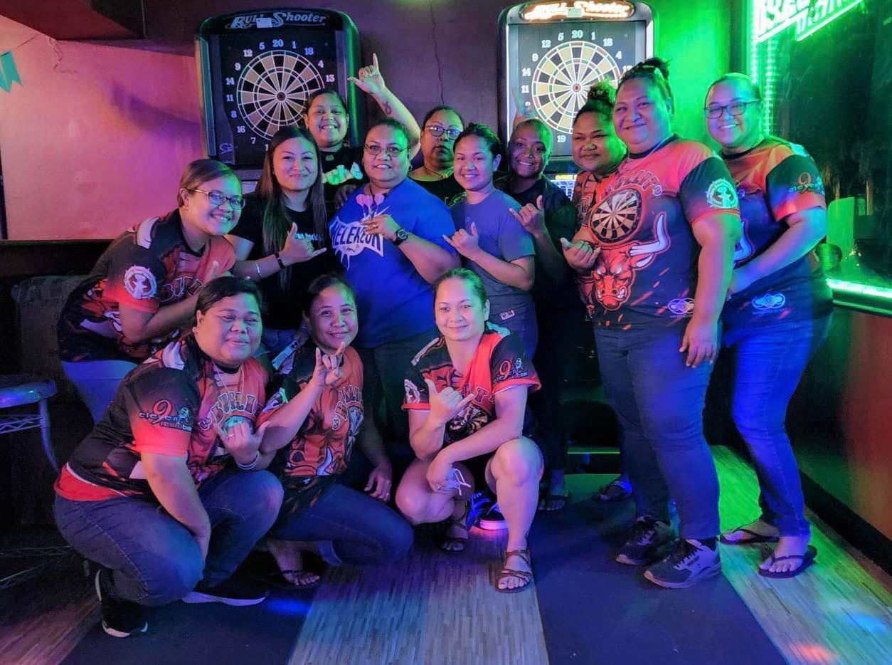 6JMS Vicious and 9 Eleven Chickazz Bull-It pose for a photo after their debut match in the Ladies Division of the SEDA Bud Light Dart League held Monday at the 9 Eleven Restobar.