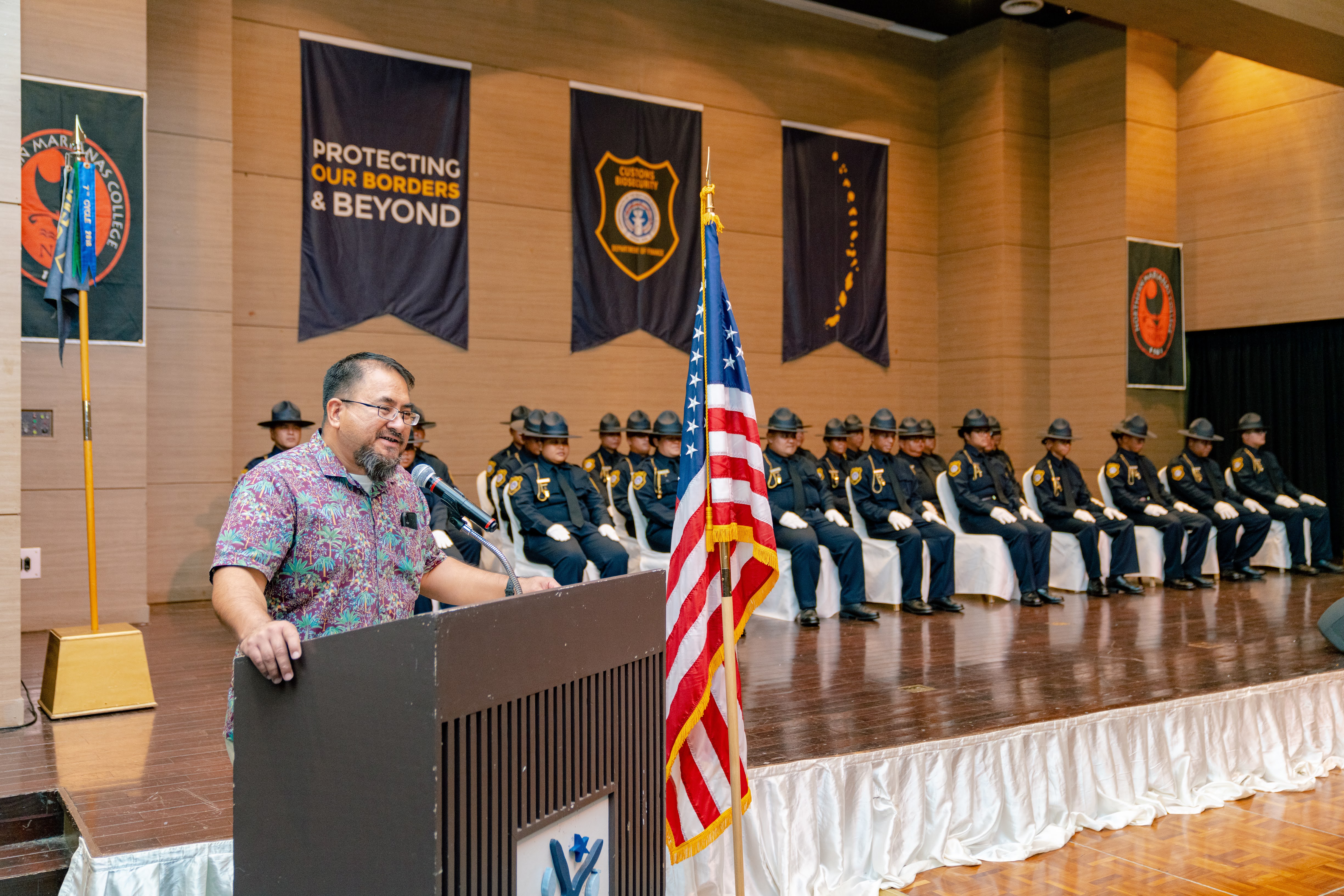 NMC Criminal Justice Department Chair LTC Clement Bermudes (USA Ret.) addresses the graduates of the 9th Cycle Academy.  He stressed the critical role that the new officers have in a “High Stakes, High Rewards” contemporary environment of “Protecting the Borders and Beyond.”