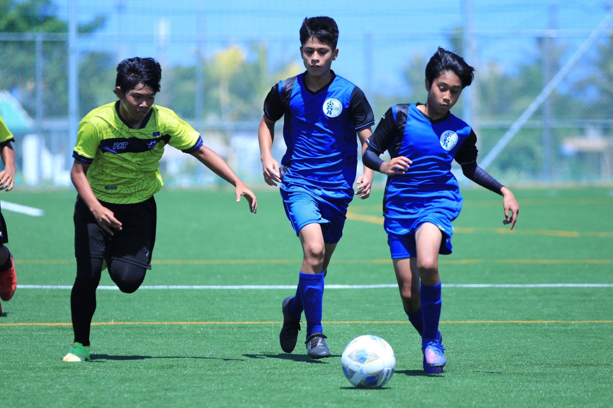 The NMI’s U15 team defeated the Guam U14 team, 6-0, at the NMI Soccer Training Center. The NMI’s Paul Lizama and Jim Takeru led the pack with two goals each while team mates Iver Lilles and Nolan Ngewakl added two more.  Photo shows the NMI's Jonne Navarro, left, chasing after Guam's Cole Sablan who is pushing forward with the possession.