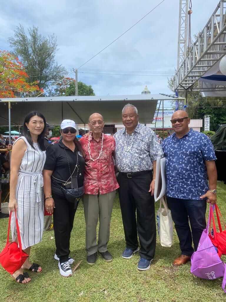 World War II survivor David "Uncle Dave" Mangarero Sablan, center, poses for a photo with Saipan Mayor David M. Apatang, Mayor's Office Field Operations Director Joann Aquino, second left, Steve Sablan, right, and his wife, left.