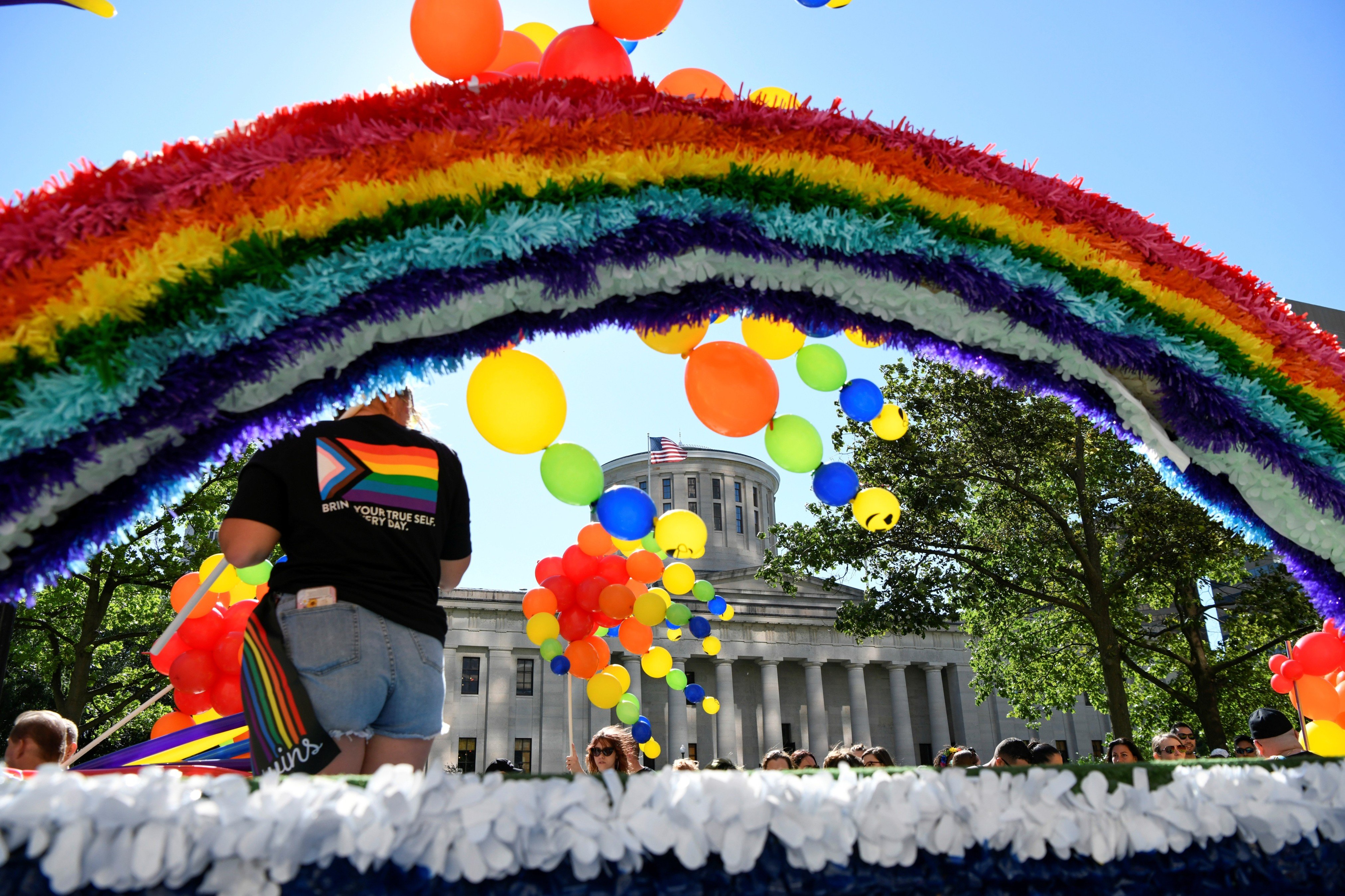 Revelers take part in pride celebrations in Columbus, Ohio, June 18, 2022.