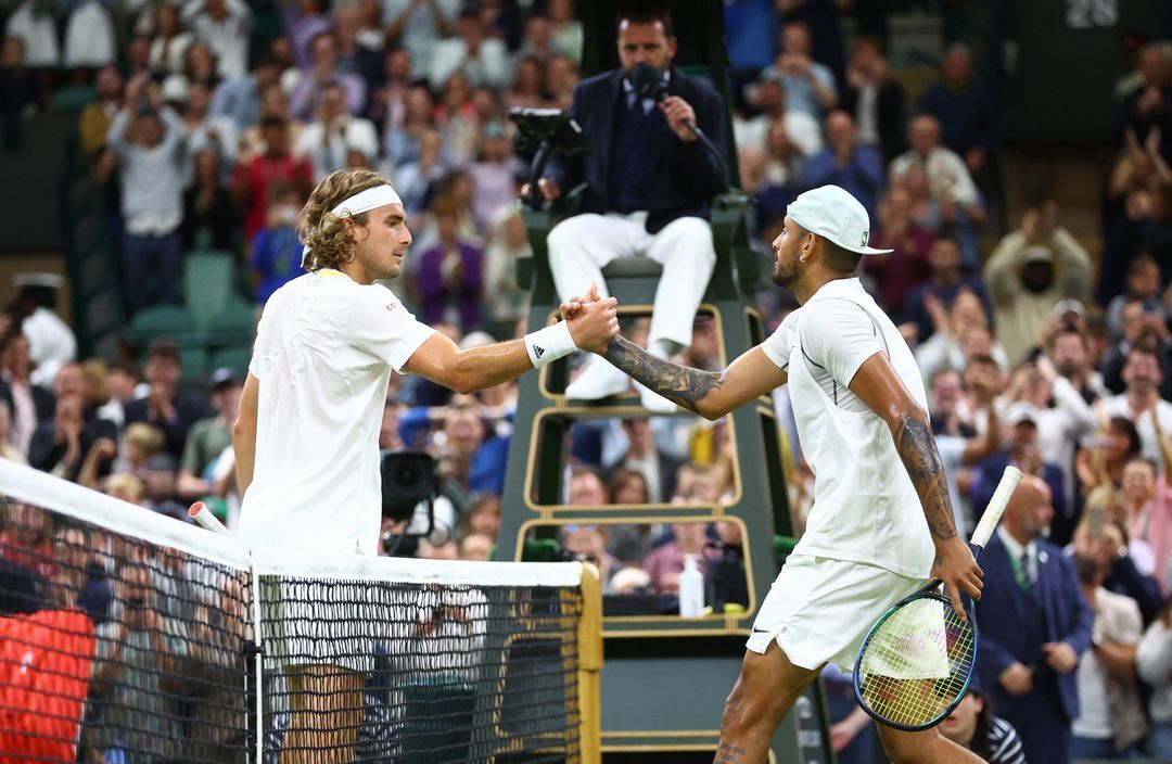 Australia's Nick Kyrgios with Greece's Stefanos Tsitsipas after their third round match at Wimbledon in London, Britain on July 2, 2022