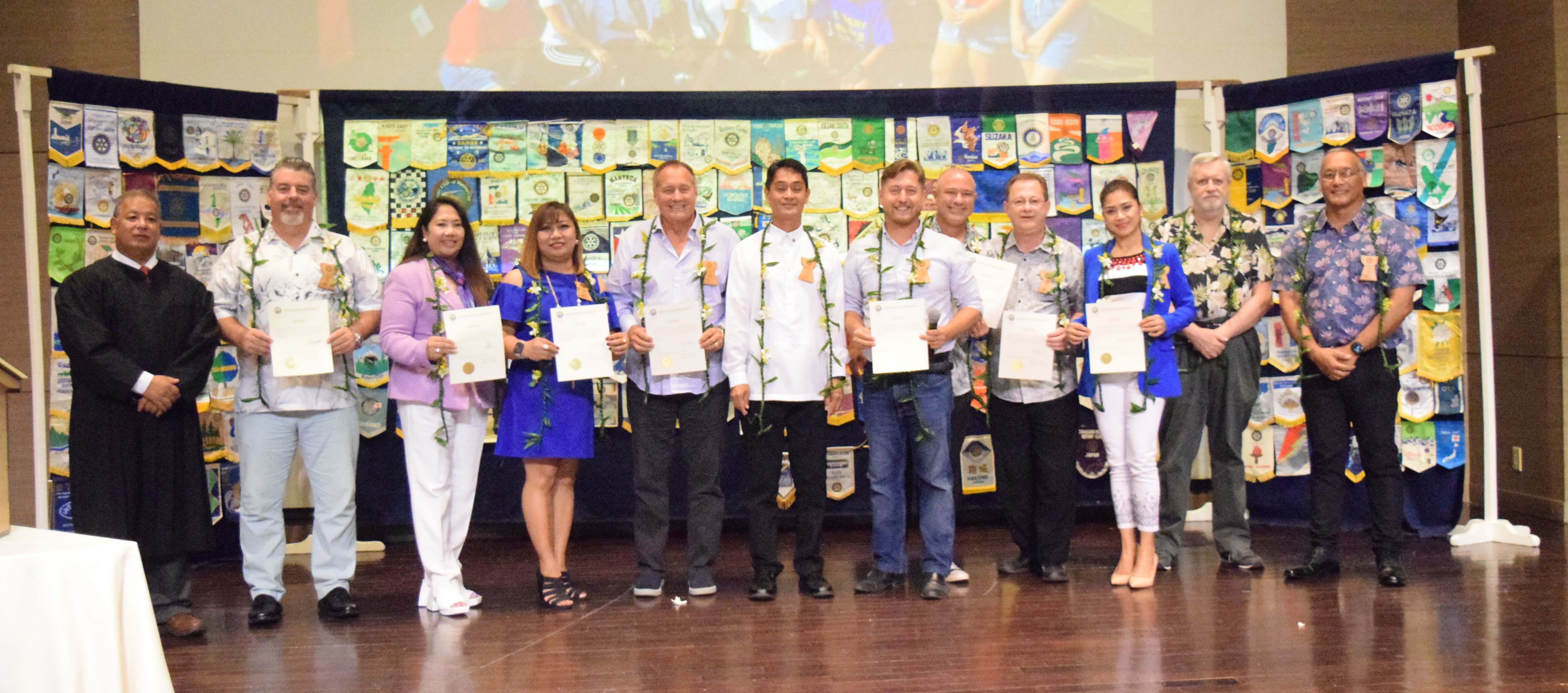 From left, Associate Justice Perry Inos; newly elected Rotary Club of Saipan Sergeant-at-Arms Mario Valentino; Rotarian of the Year Joann Aquino; club Vice President Jessy Loomis; Community Service Director Dr. Nelson Krum; new President Wendell Posadas; International Service Director Ivan Ilmov; new Generations Director Gregory Pat Borja; Vocational Service Director David Baker; Club Service Director Mary Grace Bautista; Foundation Director Wayne Gillespie; and Treasurer Charles Cepeda after they were sworn in by Justice Inos in Saipan World Resort's Royal Taga Hall on Friday.