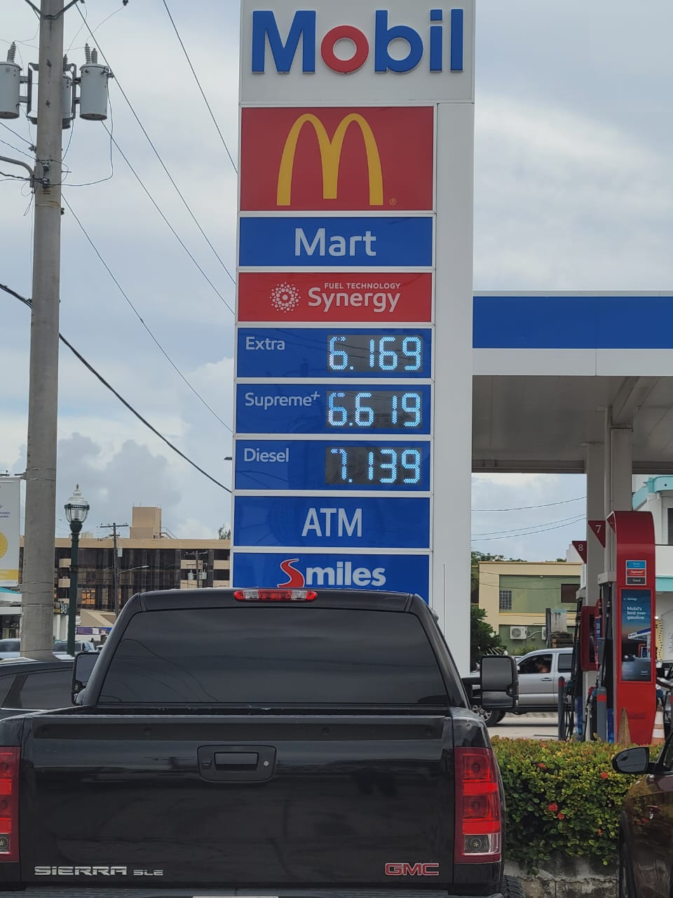 The Mobil Oil station on Beach Road in Garapan displays its new prices on Thursday.