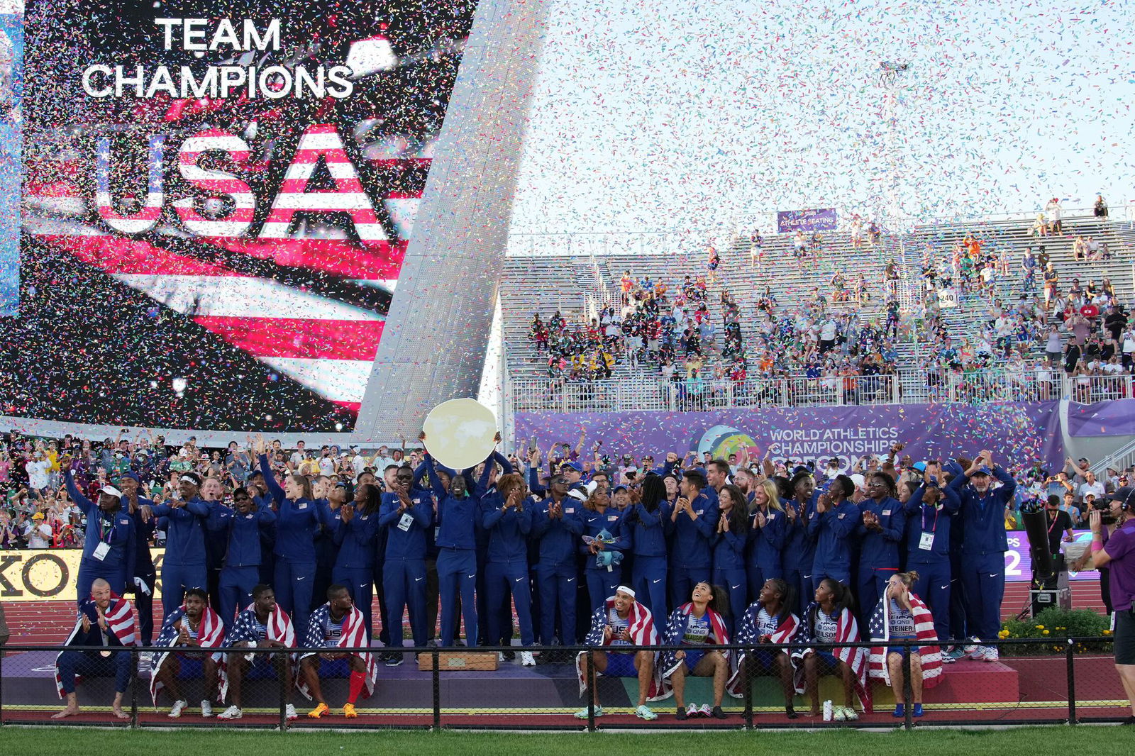 The United States track and field team celebrates as team champions at the World Athletics Championships Oregon 22 at Hayward Field in Eugene, Oregon on July 24, 2022.