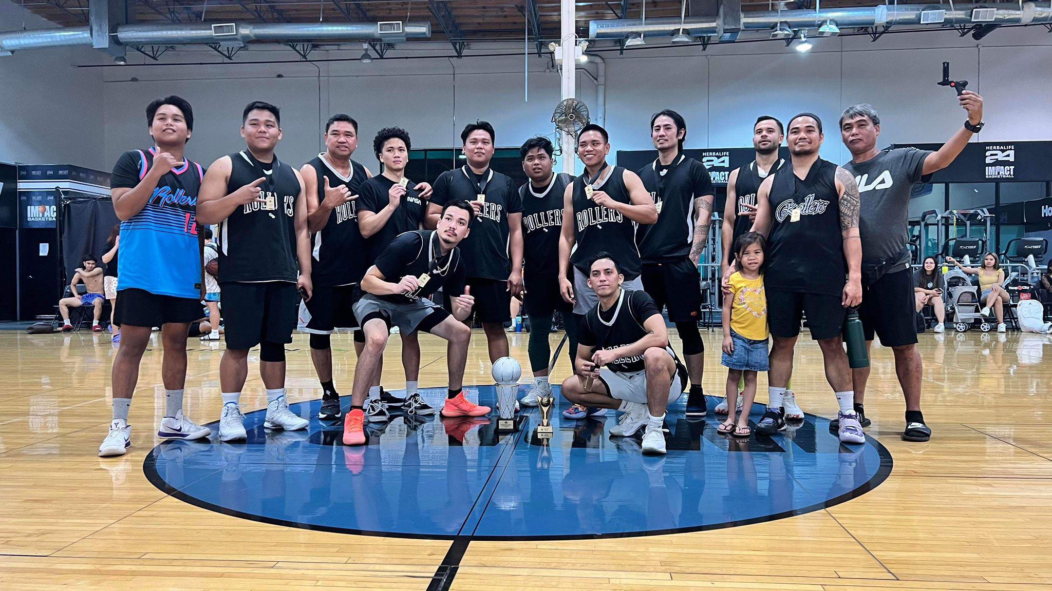 Team Rollers pose for a photo after winning the championship of the 2022 Las Vegas Fil-AM International Basketball League in Nevada over the weekend.