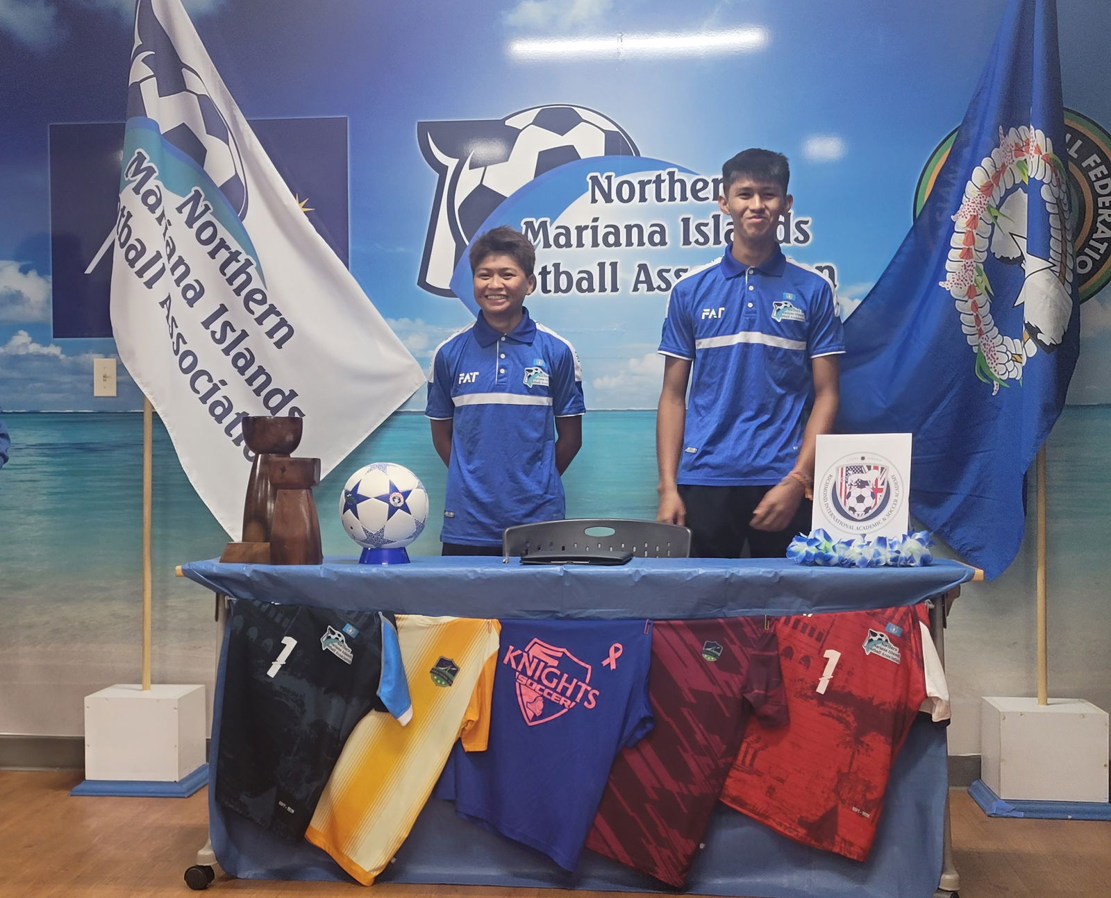 Britany Wally and Merrick Toves pose for a photo during a media  conference Friday at the NMI Football Association office in Koblerville.