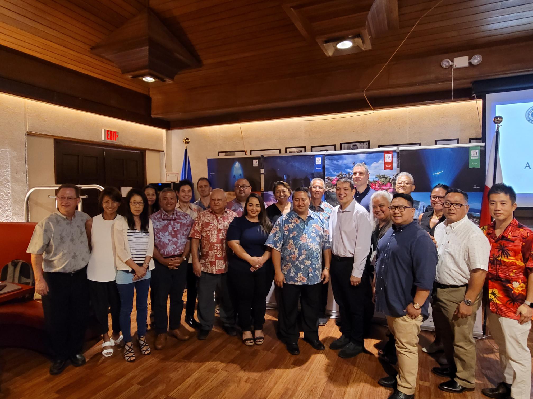 Gov. Ralph DLG Torres poses for a photo with Marianas Visitors Authority officials, Commonwealth Port’s Authority Chair Kimberlyn King-Hinds, Alex Sablan of the Governor’s Council of Economic Advisers, and United Airlines Managing Director of Airport Operations for Asia Pacific Sam Shinohara, at the Aqua Resort Club during a press conference on United Airlines’ upcoming Japan-Saipan flight service on Saturday, July 2.