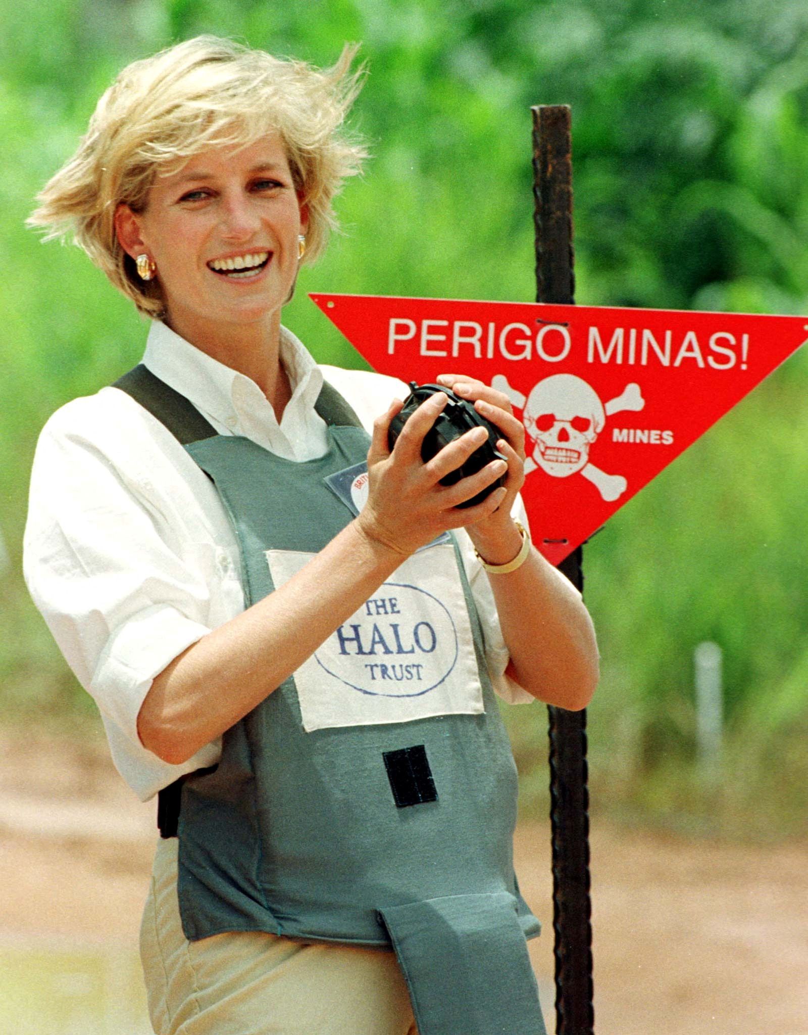 Diana, Princess of Wales, holds a landmine in one of the safety corridors of the landmine field in Huambo, Angola on Jan. 15, 1997 during a visit to help a Red Cross campaign outlaw landmines worldwide.
