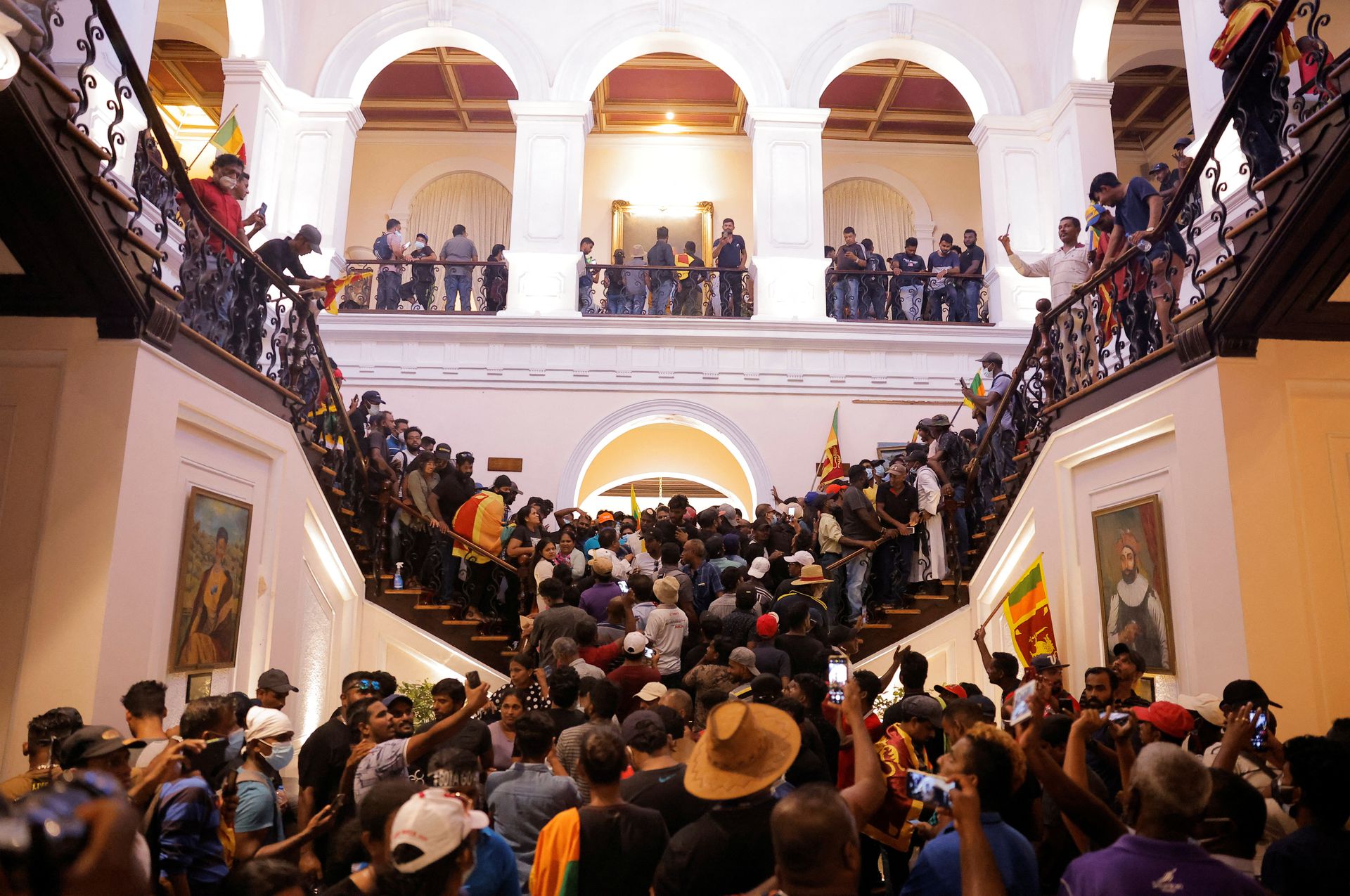 Demonstrators protest inside the President's House, after President Gotabaya Rajapaksa fled, amid the country's economic crisis, in Colombo, Sri Lanka, July 9, 2022.