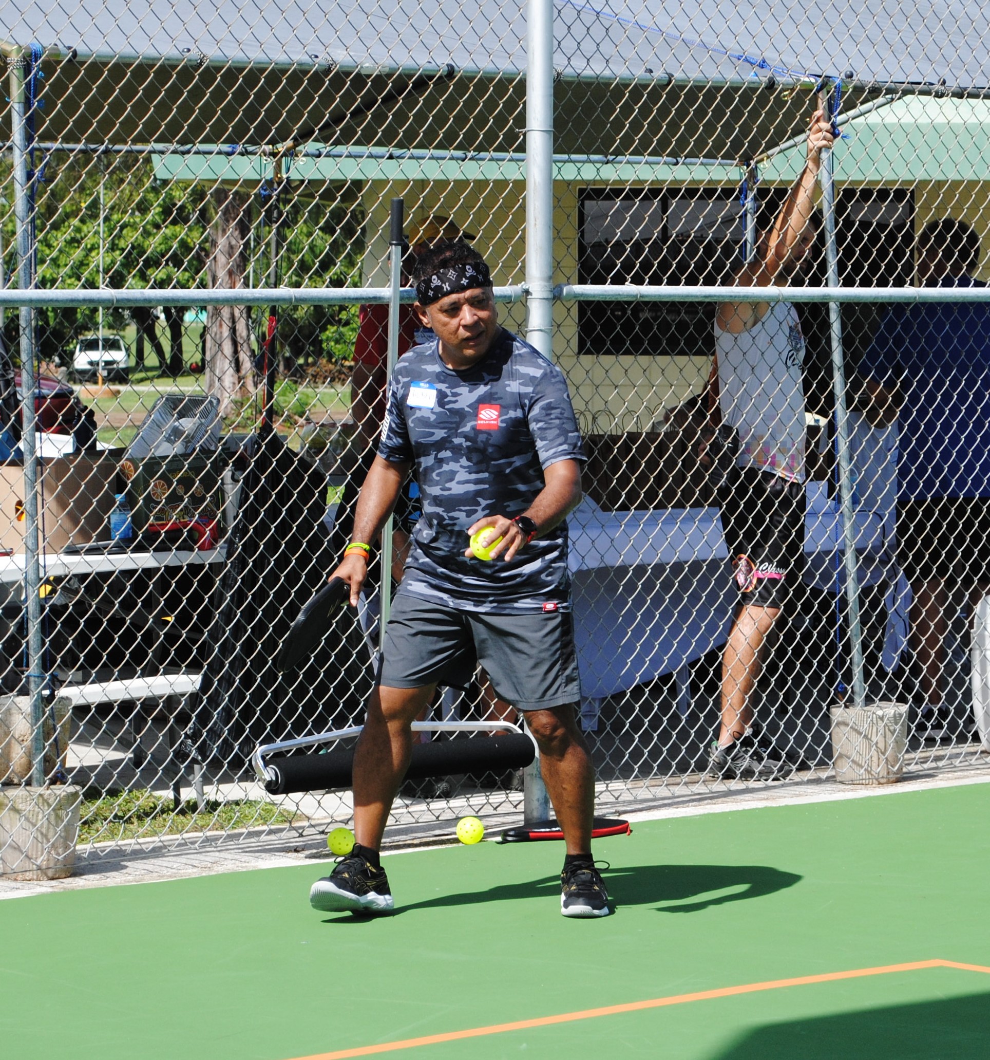 Guam's Albert Manansala preps for the serve.