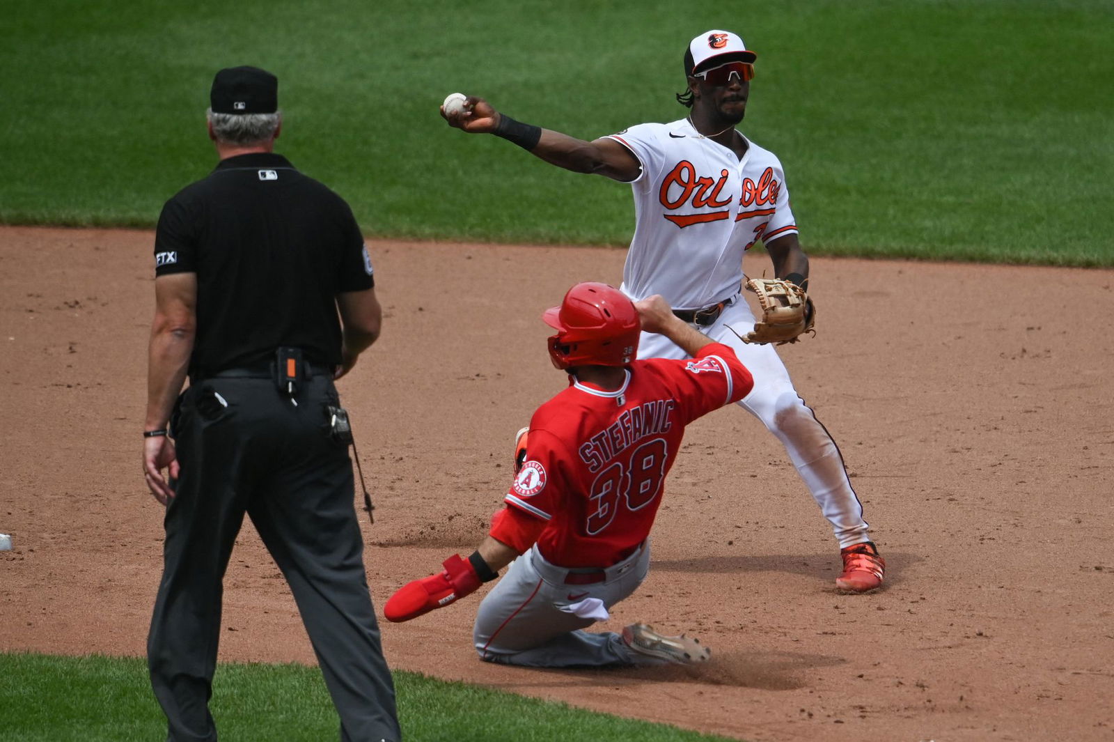 Baltimore Orioles shortstop Jorge Mateo (3) throws to second base after the force out of Los Angeles Angels second baseman Michael Stefanic (38) during the ninth inning at Oriole Park at Camden Yards in Baltimore, Maryland on July 10, 2022.