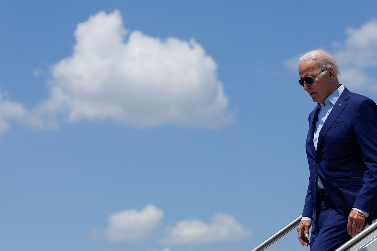 President Joe Biden arrives aboard Air Force One at T.F. Green International Airport in Warwick, Rhode Island, July 20, 2022.