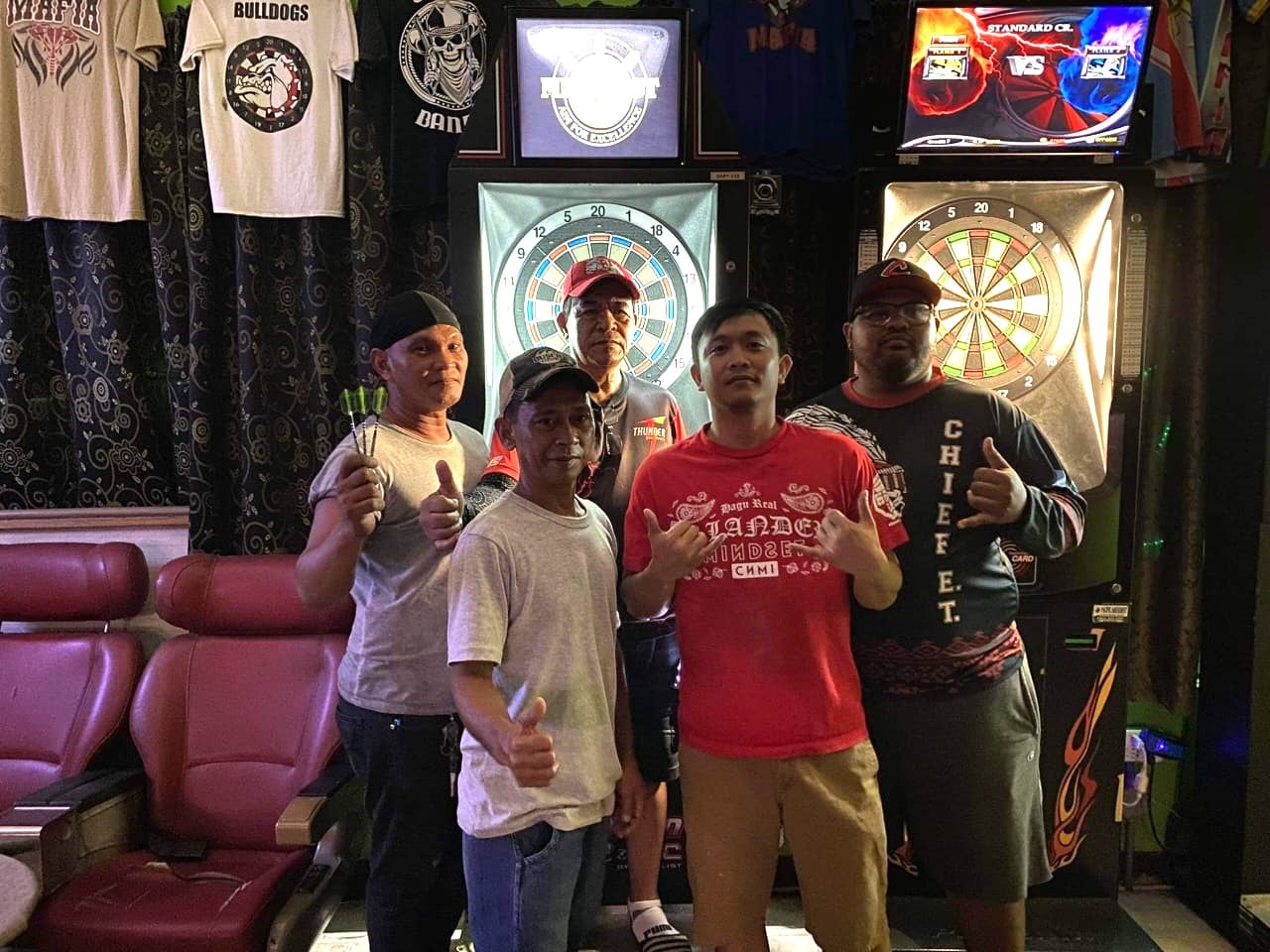 6JMS Thunder Darts Impact team members pose for a photo after playing a match in the “A+” Division of the SEDA Bud Light Dart League at 6JMS Sports Bar.