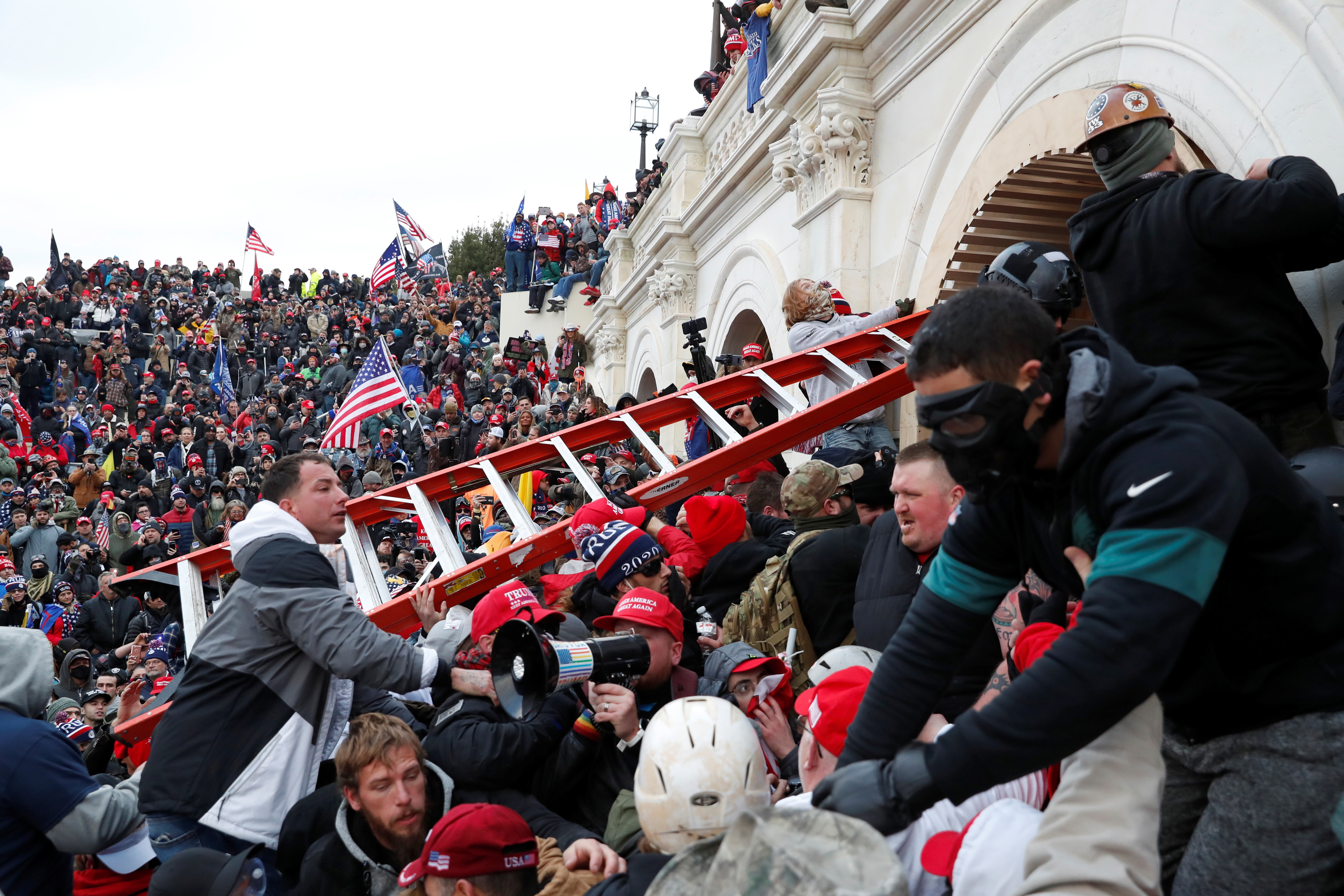 Pro-Trump protesters storm into the U.S. Capitol during clashes with police, during a rally to contest the certification of the 2020 U.S. presidential election results by the U.S. Congress, in Washington, D.C, Jan. 6, 2021.