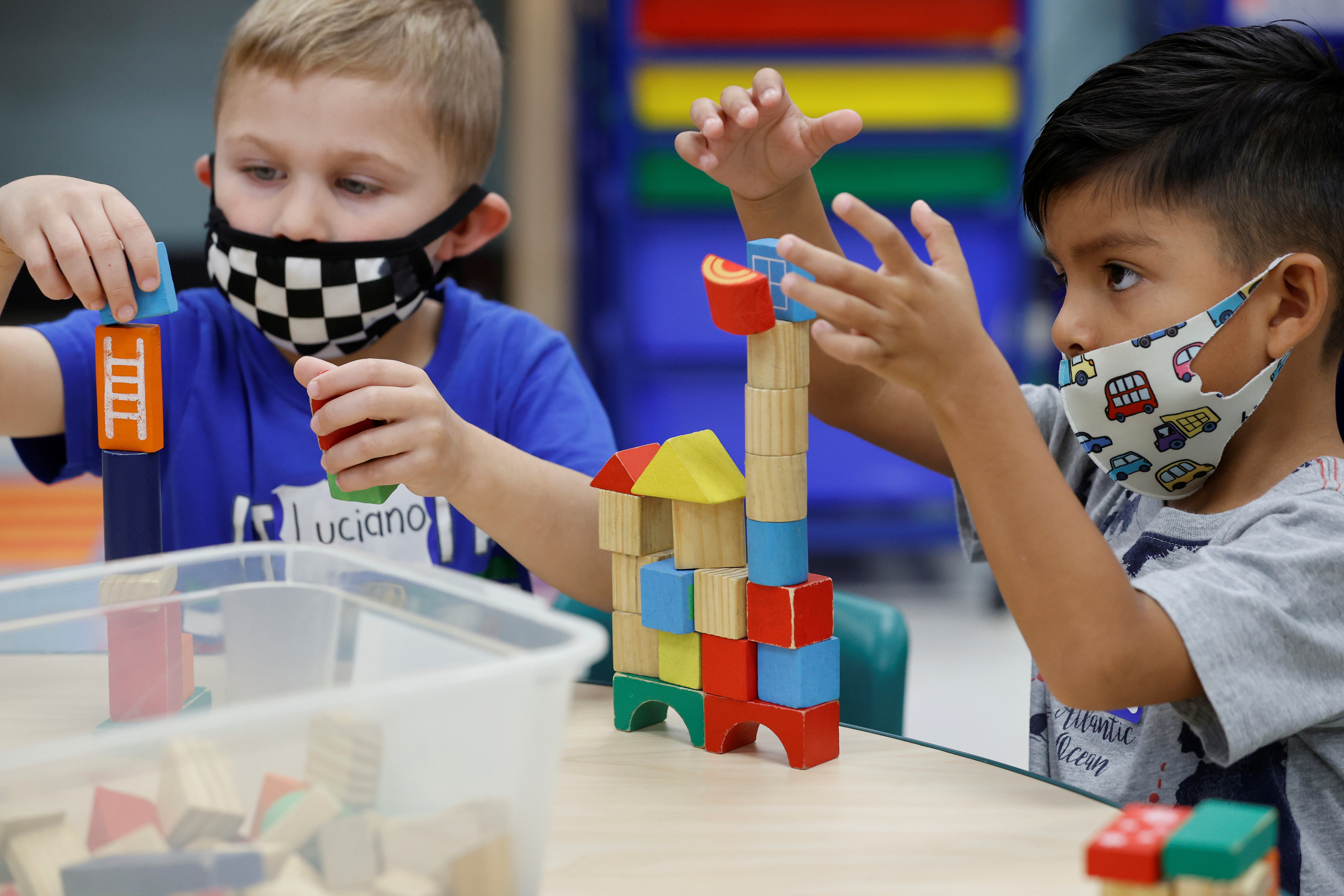 Children wear  masks and wait for President Joe Biden to visit their pre-Kindergarten class at East End Elementary School in North Plainfield, New Jersey, Oct. 25, 2021.