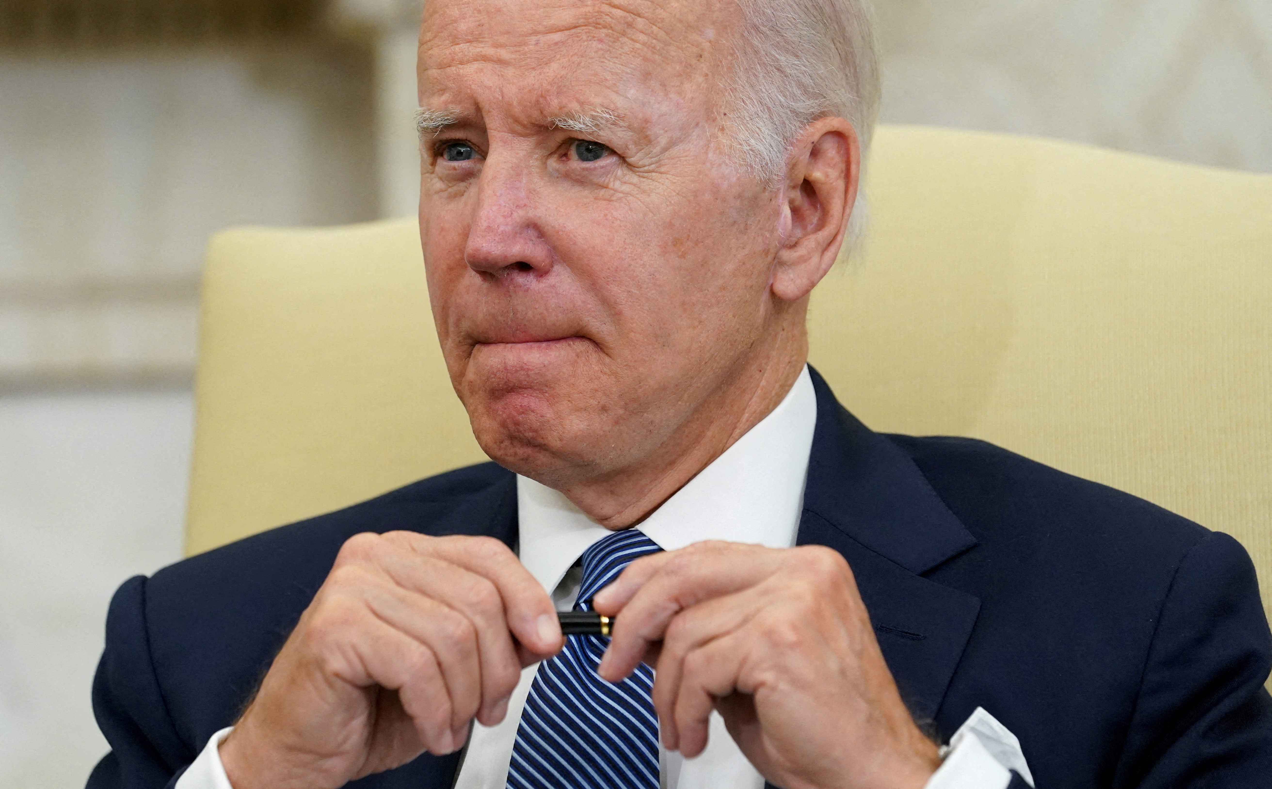 President Joe Biden listens during a meeting in the Oval Office of the White House in Washington, D.C., July 12, 2022.