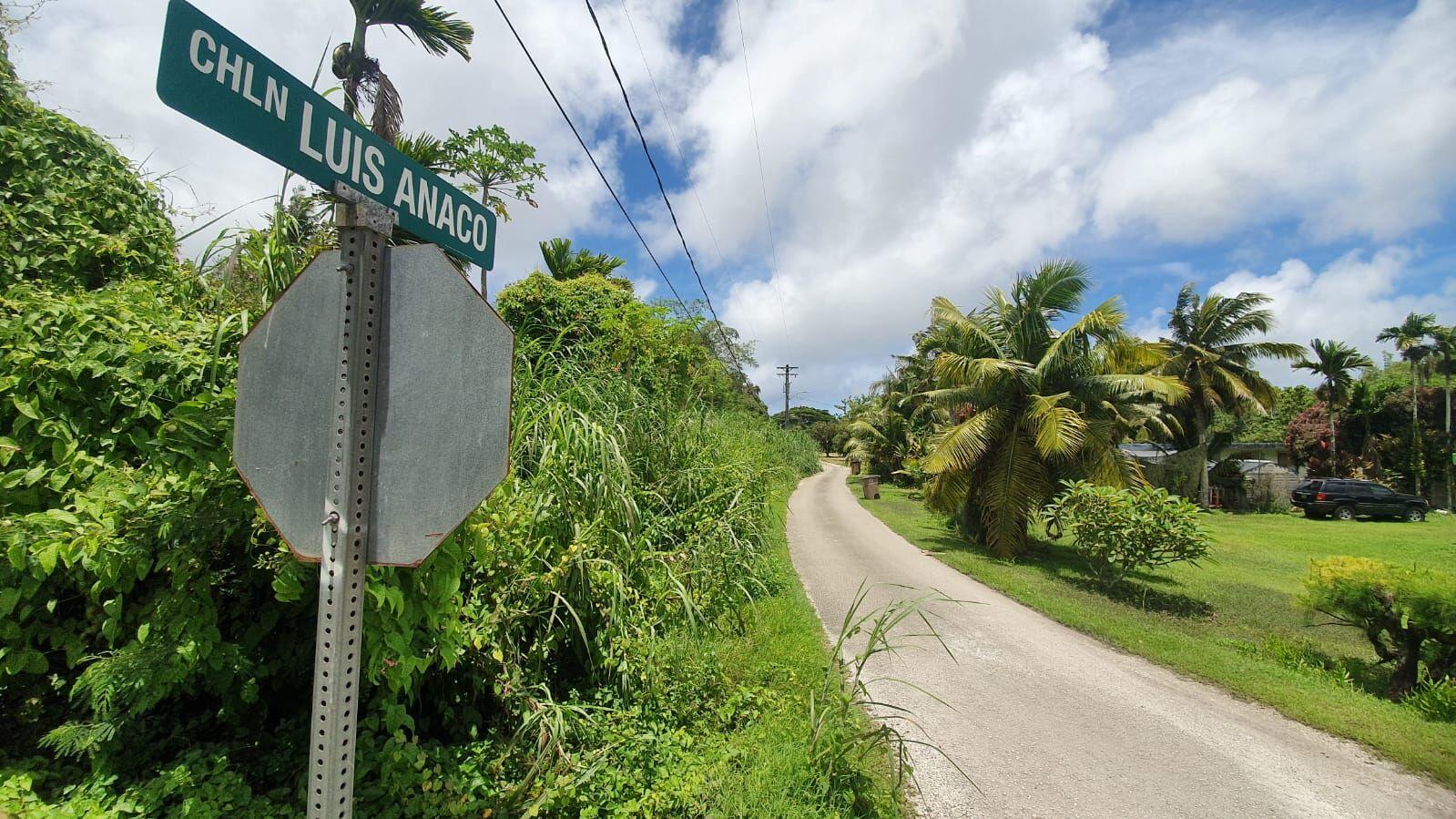 The area in Yigo where police responded to a report of a foul odor before a decomposed body was found behind a residence Monday morning.