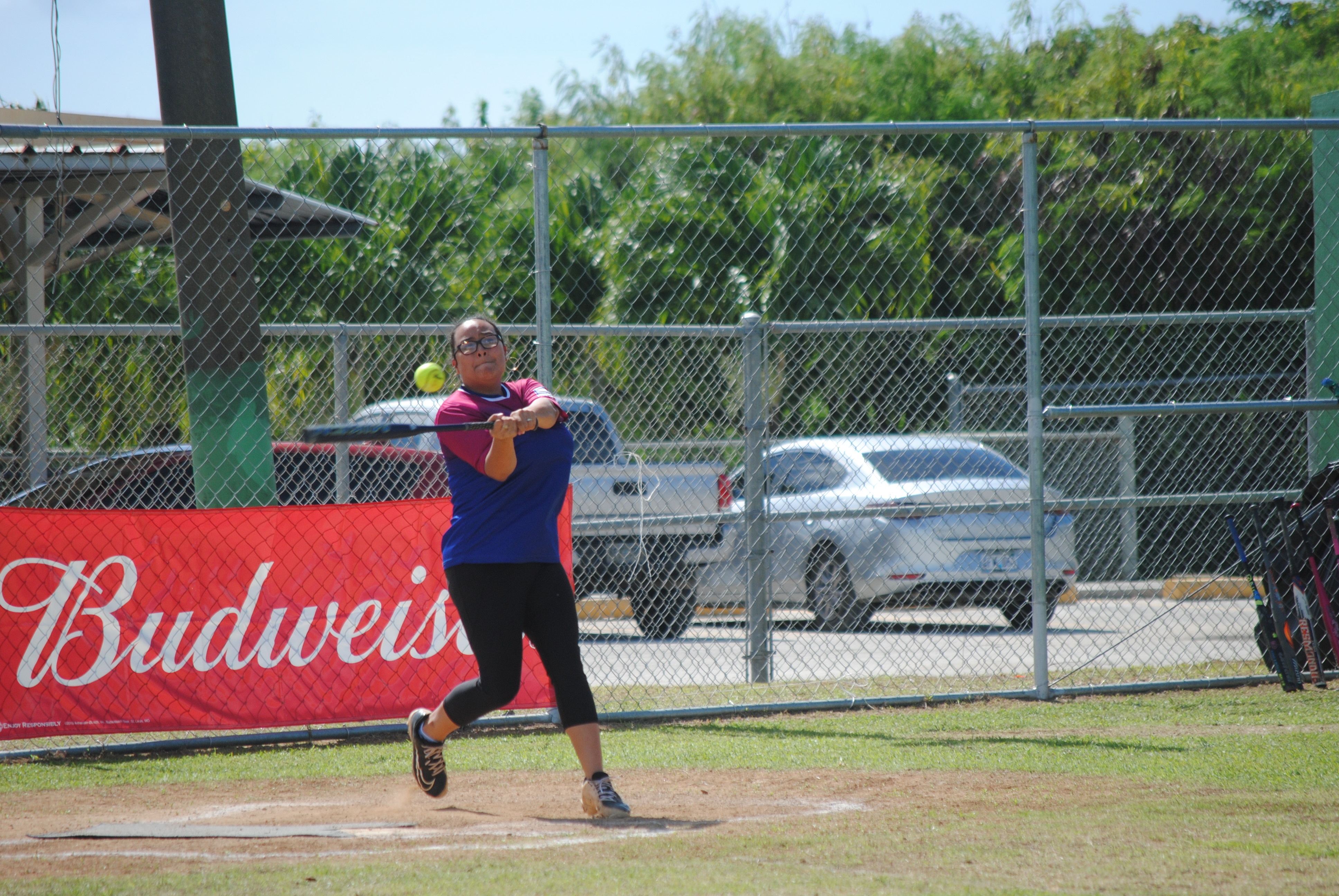 Hotshots' first basewoman Jan connects the hit during a Ladies Division game of the Budweiser Belau Amateur Softball League on Sunday at the Dandan baseball field.