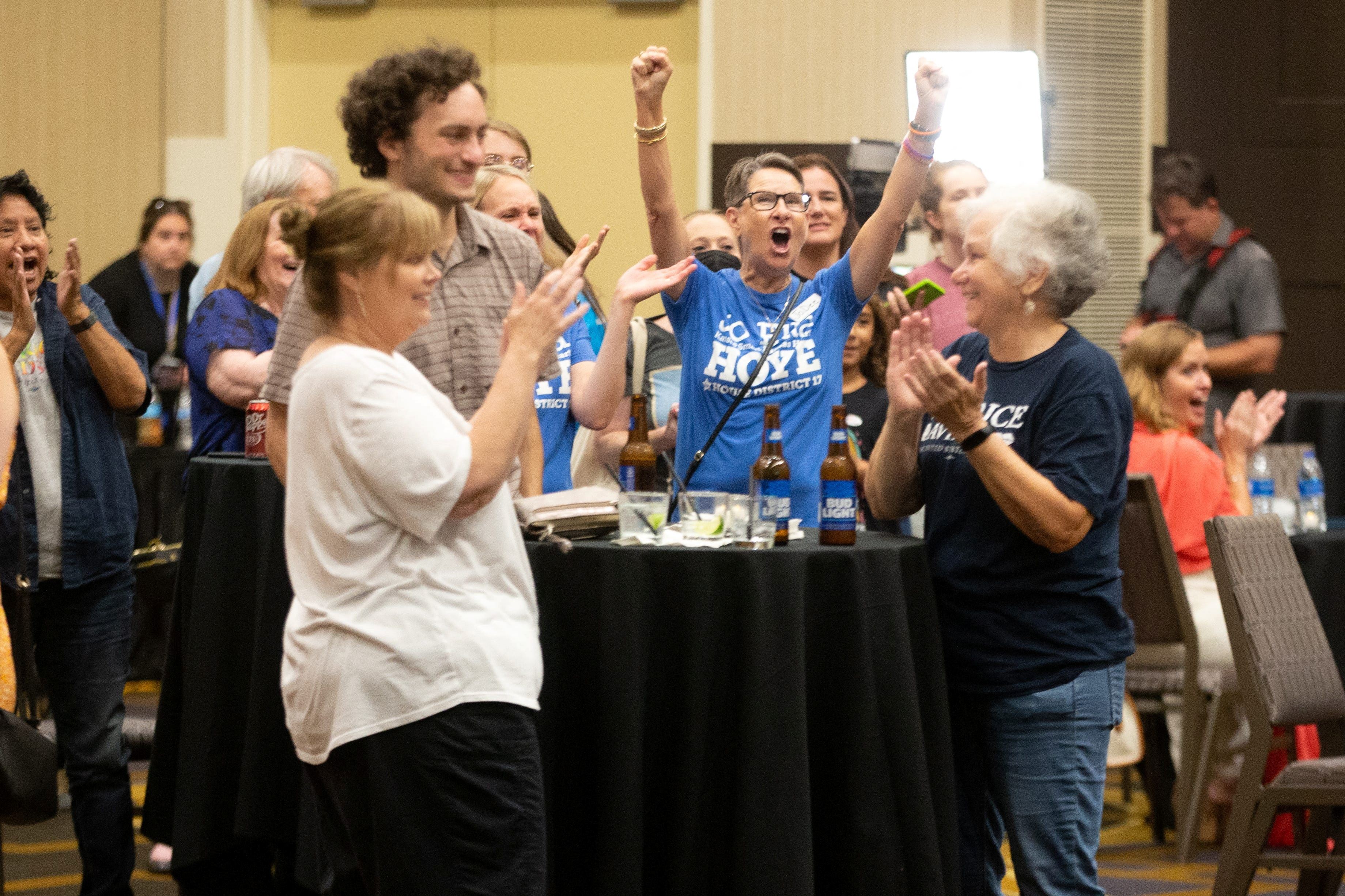 Abortion-rights supporters react as early polls showed that voters rejected a state constitutional amendment that would have declared there is no right to abortion, at a Kansans for Constitutional Freedom election watch party in Topeka, Kansas, Aug. 2, 2022.
