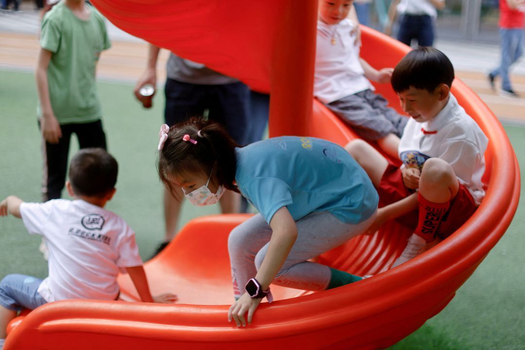 Children play at a playground inside a shopping complex in Shanghai, China on June 1, 2021.