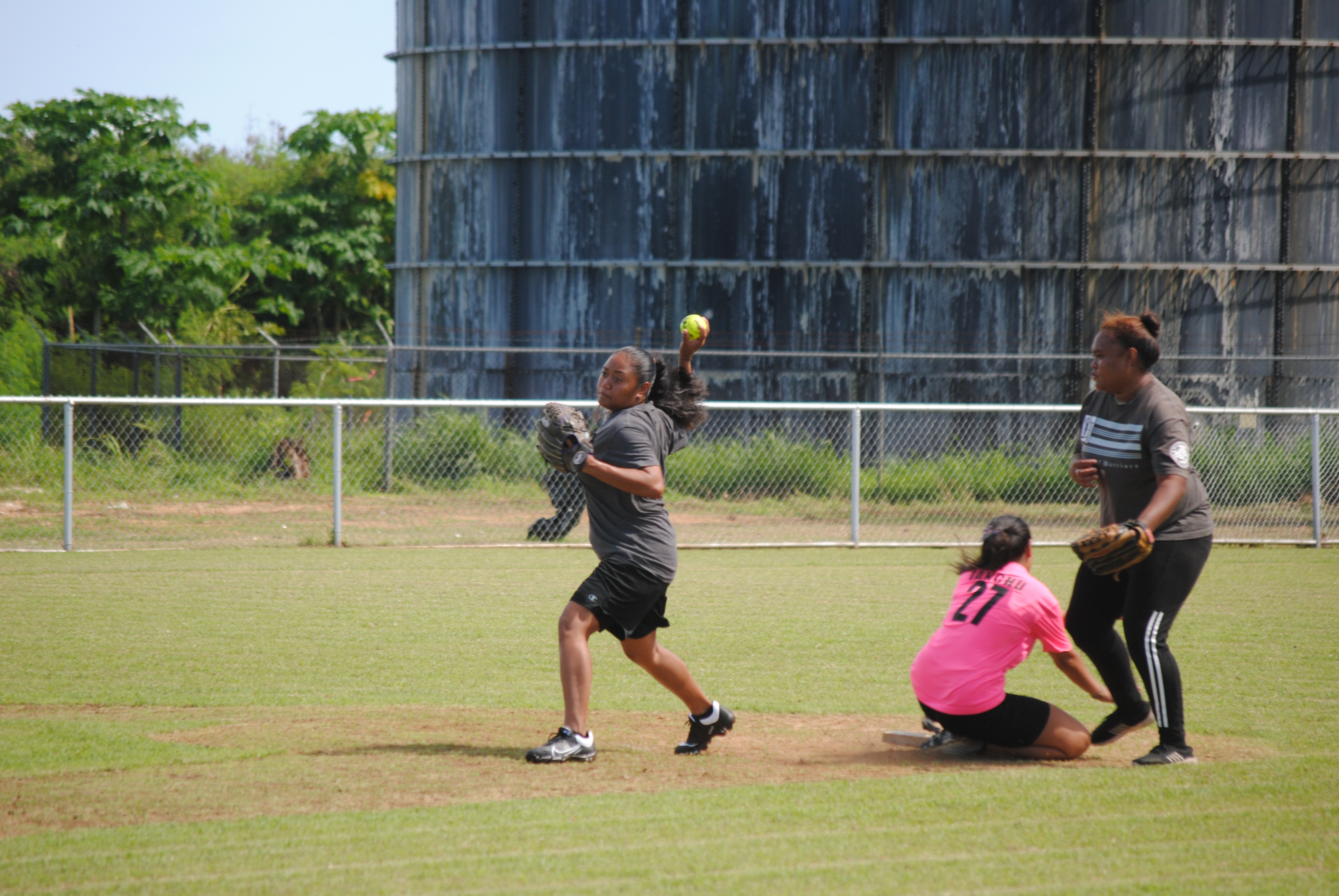 Lady Eagles' second baseman Alana Sumang throws to first base for the double-play during a 2022 Budweiser Belau Amateur Softball League game Sunday at the Dandan baseball field.
