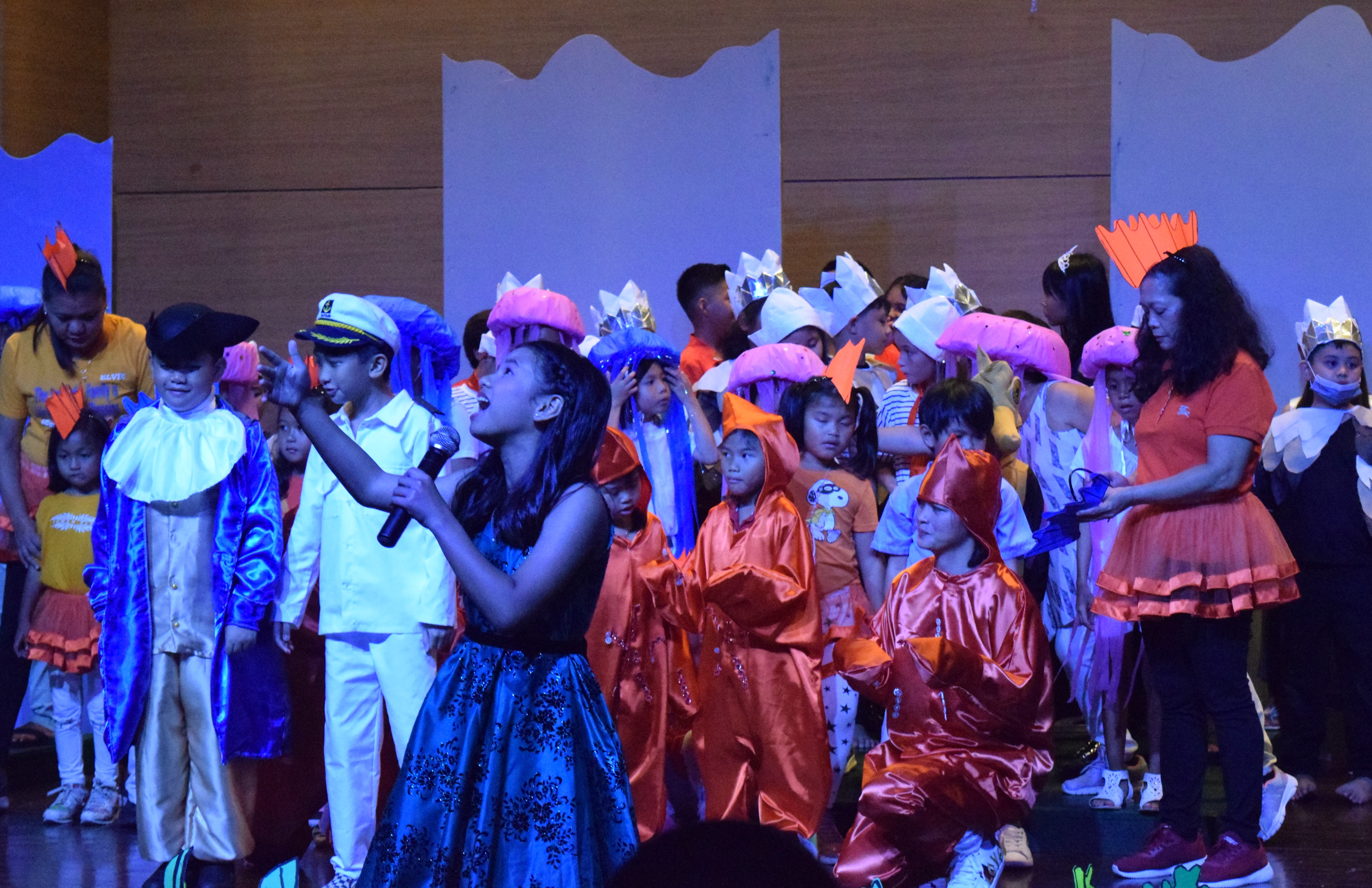 Eighth grader Alyana Marie Rotap performs a song number.