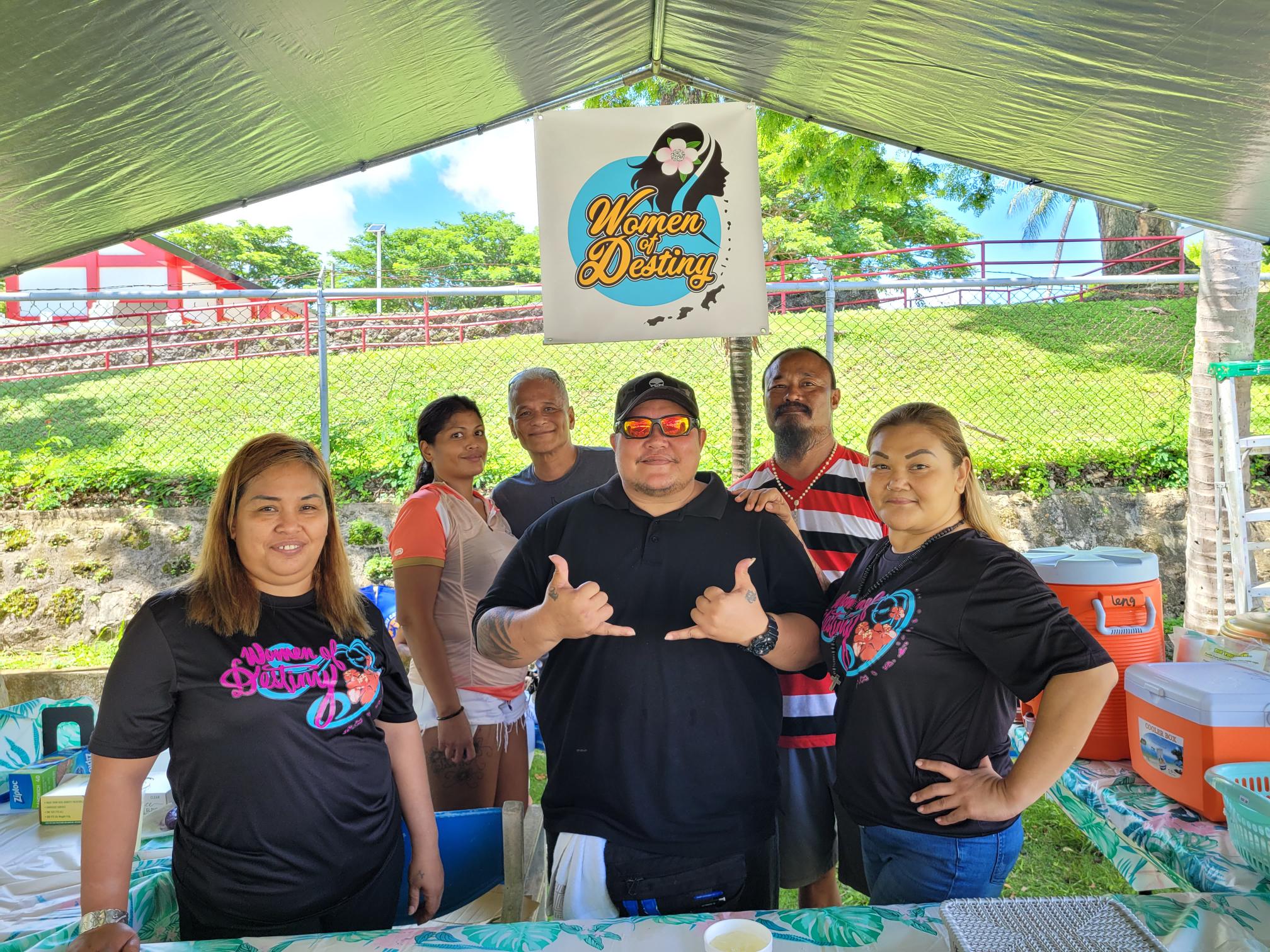 NMI Women of Destiny President Lorraine Ada, left, with members and other supporters at the Manamko’ Center donation drive on July 30, 2022.