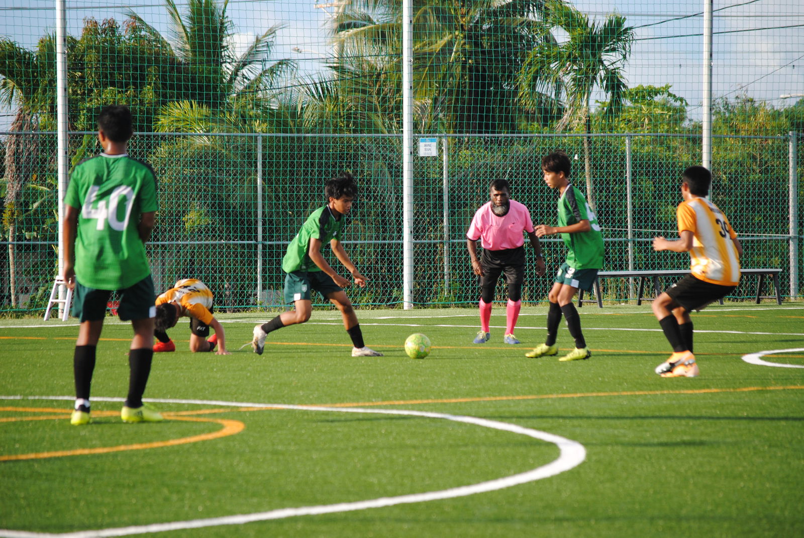 Tan Holdings’ Anthony Austria and Anthony Bergancia secure the possession after a successful interception.