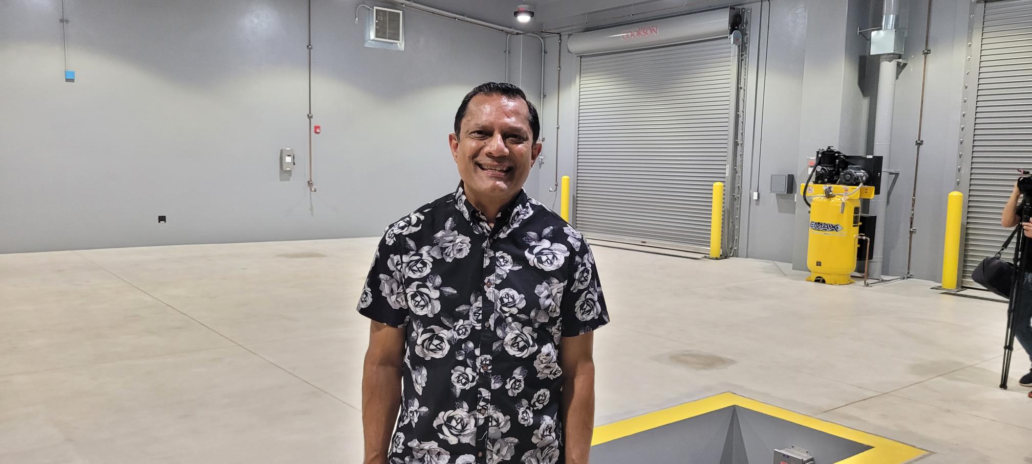 Federal Transit Administration Region IX Administrator Ray Tellis poses for a photo in the new facility.