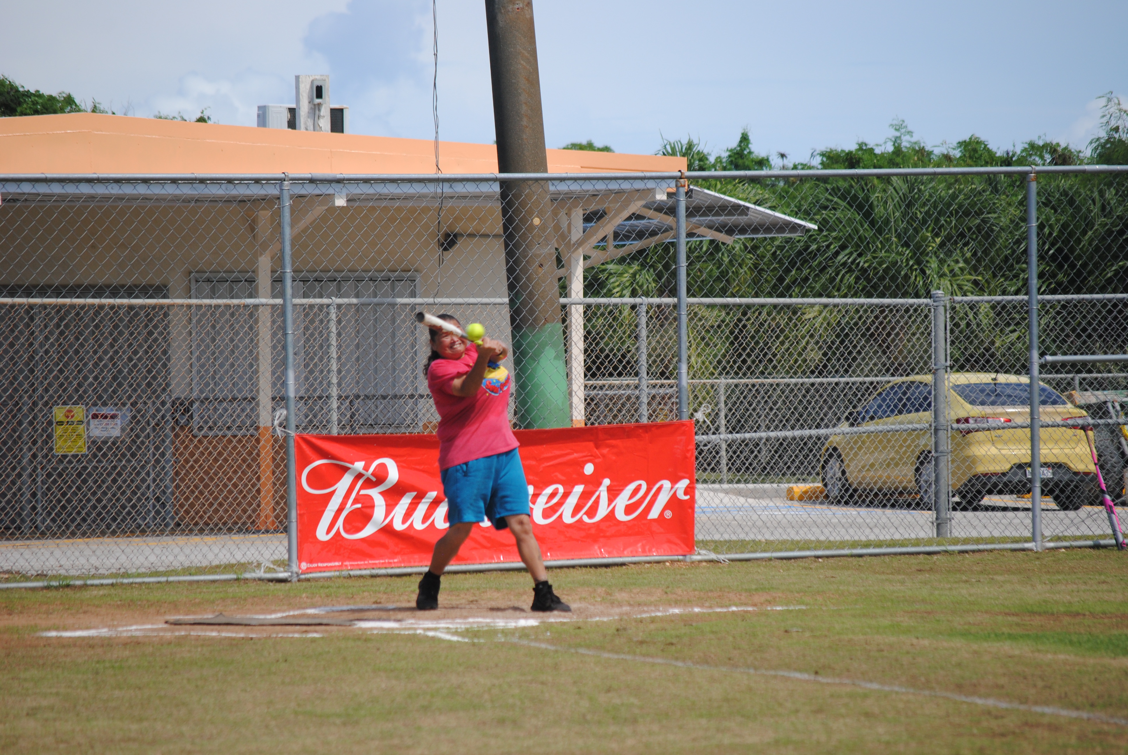 Tokahao Ladies' Eileen Babauta connects the game-winning single during a 2022 Budweiser Belau Amateur Softball League game Sunday at the Dandan baseball field.