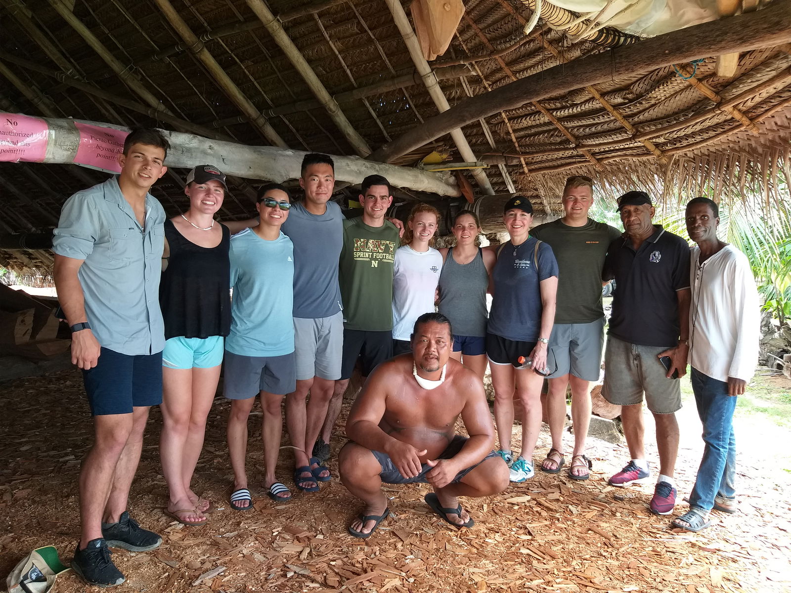 John Castro-Mames, program coordinator for the seafaring traditions program under the Commonwealth Council for Arts and Culture, front, with, from left, Charlie Sewell, Ellie Dabney, Molly Mangan, Capt. Bob Qu, Aidan Otero, Ava Izenour, Becca Vavasseur, Col. Maria "MJ" Pallotta, PhD., Carson Hillier, along with Willy Kaitabu and guide Walt Goodridge.
