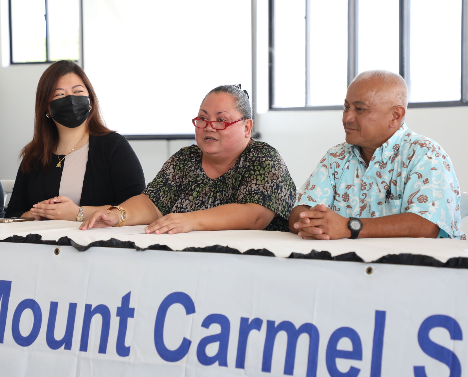 Frances T. Taimanao, center, is Mount Carmel School’s new president. Also in photo are MCS board member Jacqueline Che, left, and chairman of the board Vicente Babauta.