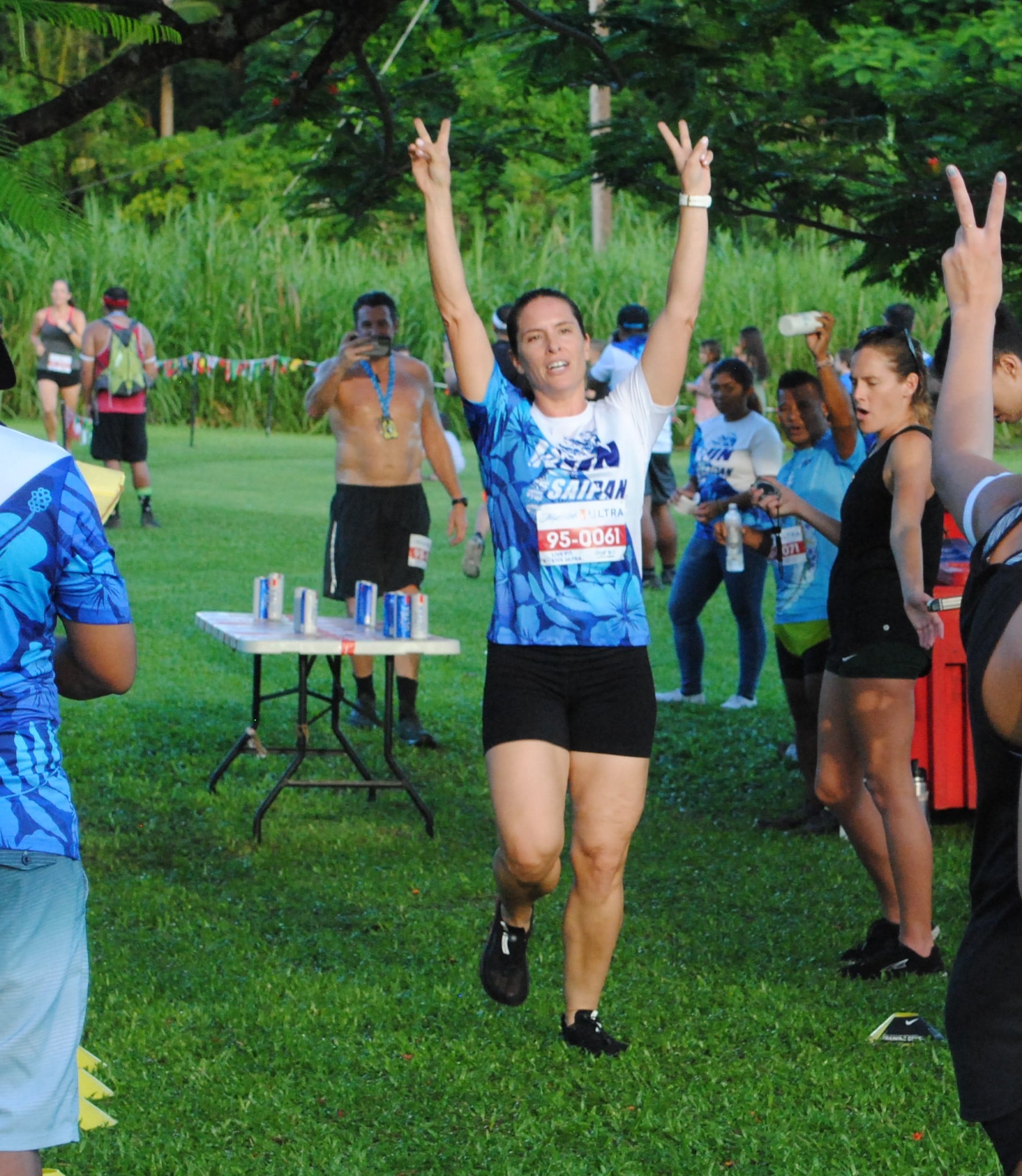 Third placer Robyn Spaeth celebrates after crossing the finish line.