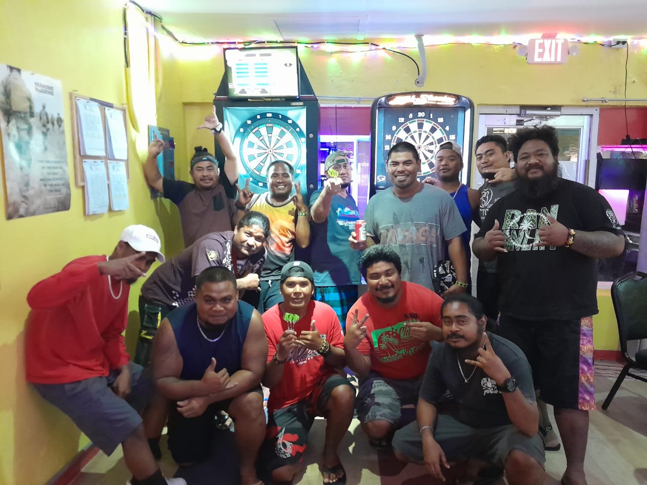 Tambayan Boys Kill 5 and Oleai Smokerz ​pose for a photo after their match in the Latte Stone Tuesday “B” Division of the SEDA Bud Light Dart League at Tambayan Bar.