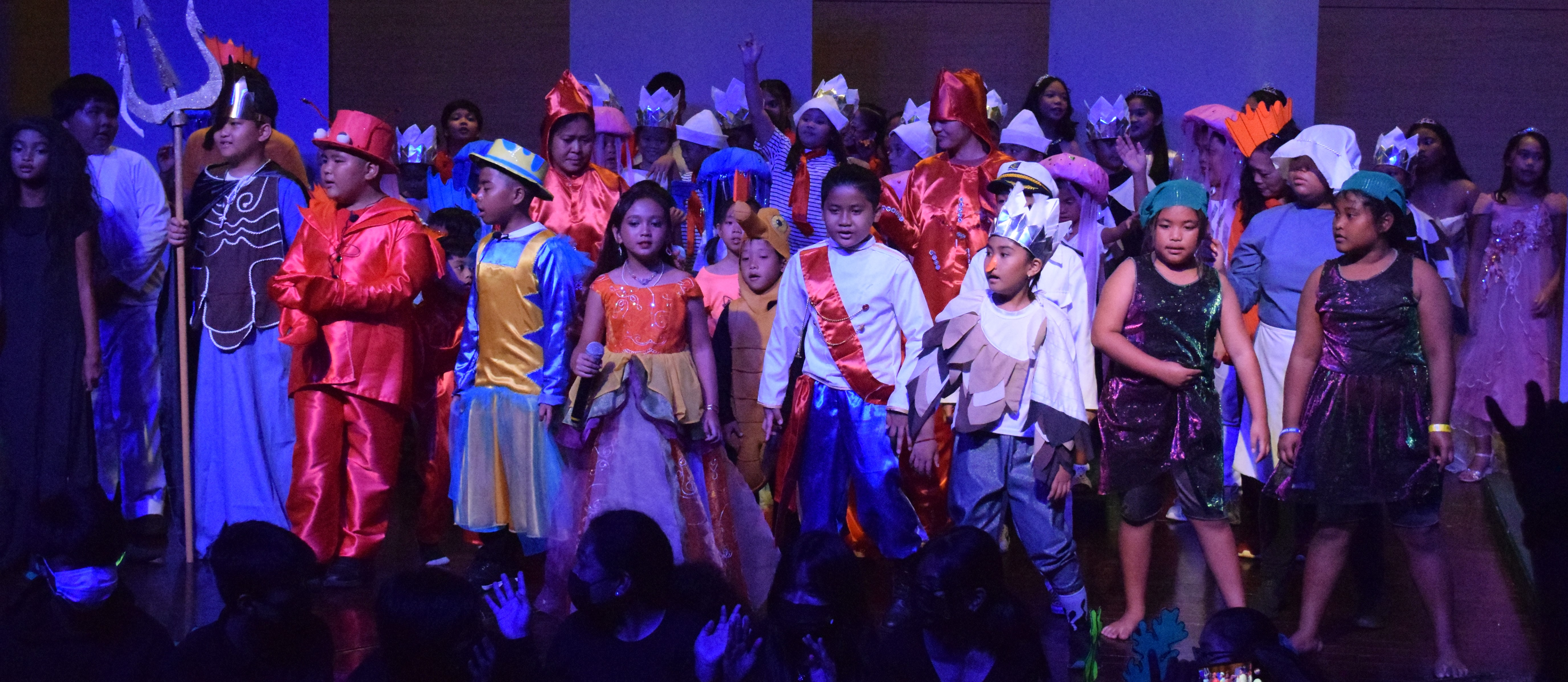 The cast members of Green Meadow School’s Little Mermaid take a curtain call.
