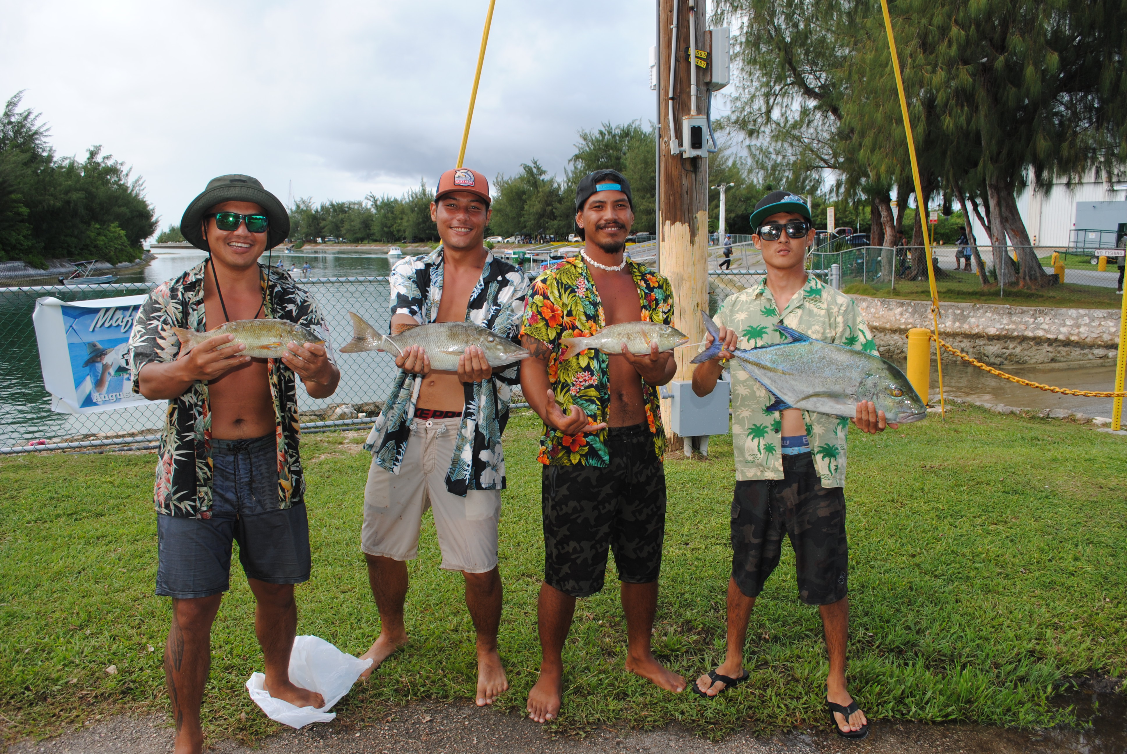 The Salty Bandits pose with their catch which won first place in the total weight category and the side bet of the 4th Annual ISLA Mafuti Derby on Saturday at Smiling Cove Marina.