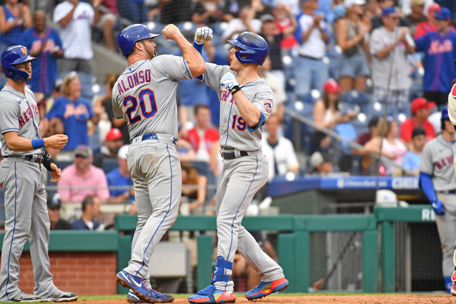 New York Mets left fielder Mark Canha (19) celebrates his three run home run with first baseman Pete Alonso (20) against the Philadelphia Phillies during the seventh inning at Citizens Bank Park in Philadelphia, Pennsylvania,  Aug. 21, 2022.