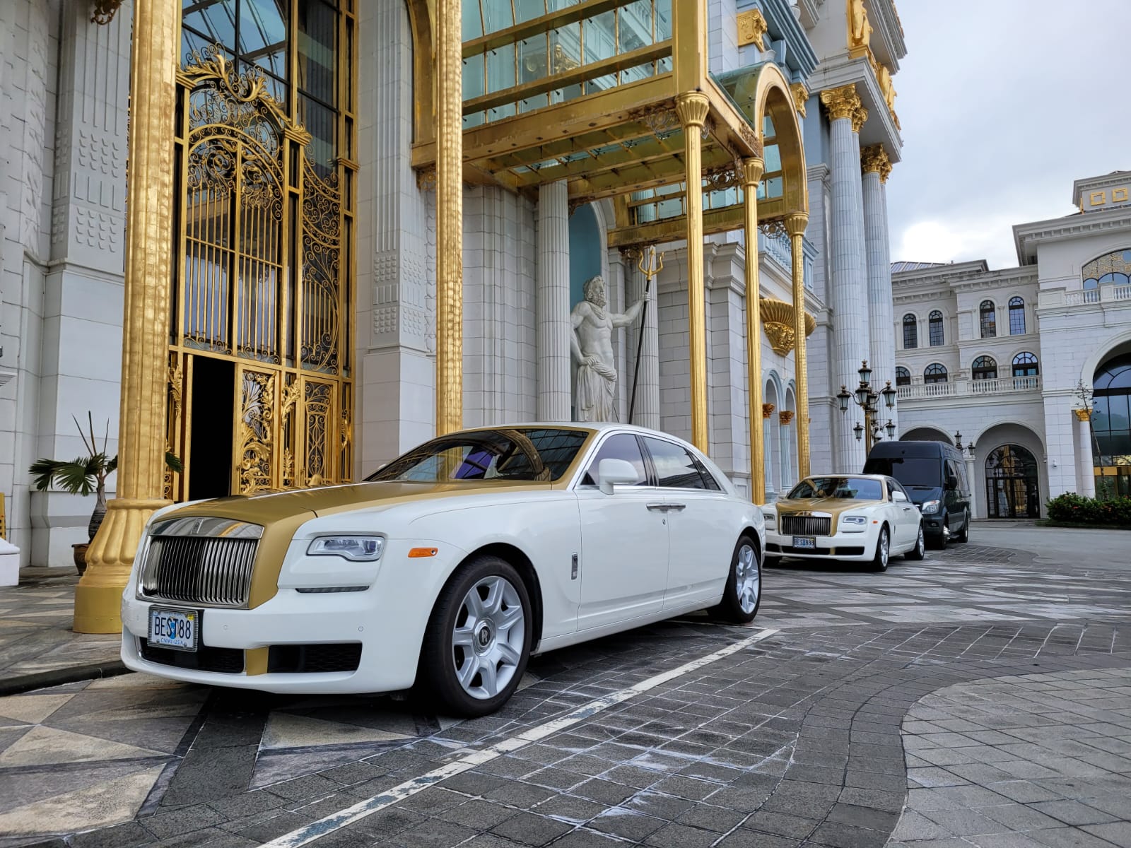 Two 2015 Rolls-Royce Ghost sedans were parked outside the Imperial Pacific International’s unfinished hotel-casino building earlier this week.