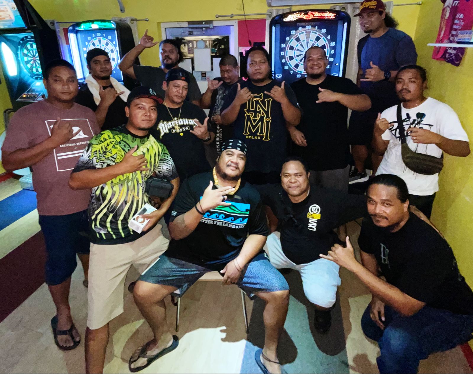 Tambayan FNG and True North Hit Em Up pose for a photo after their match Wednesday in the “C” Division of the SEDA Bud Light Dart League at Tambayan Bar.