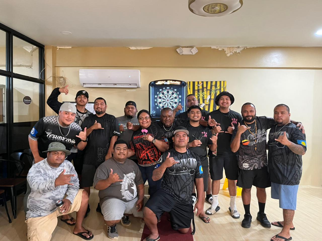 Rendezvous Mezzing and the Safehouse Seikid Darters pose for a photo after their match Wednesday in the “C” Division of the SEDA Bud Light Dart League at Rendezvous.
