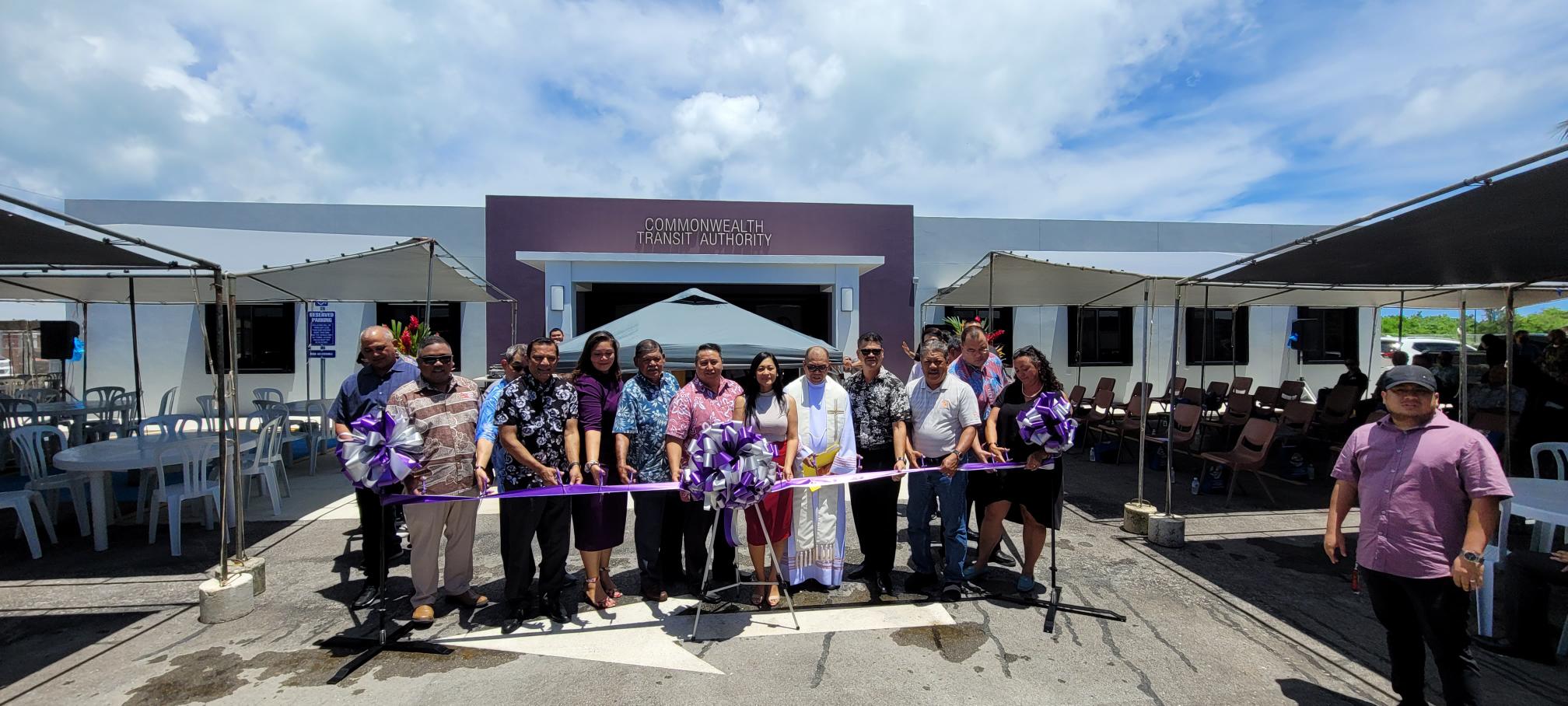 CNMI officials led by Gov. Ralph DLG Torres cut the ceremonial ribbon, marking the official opening of the new Commonwealth Office of Transit Authority facility.