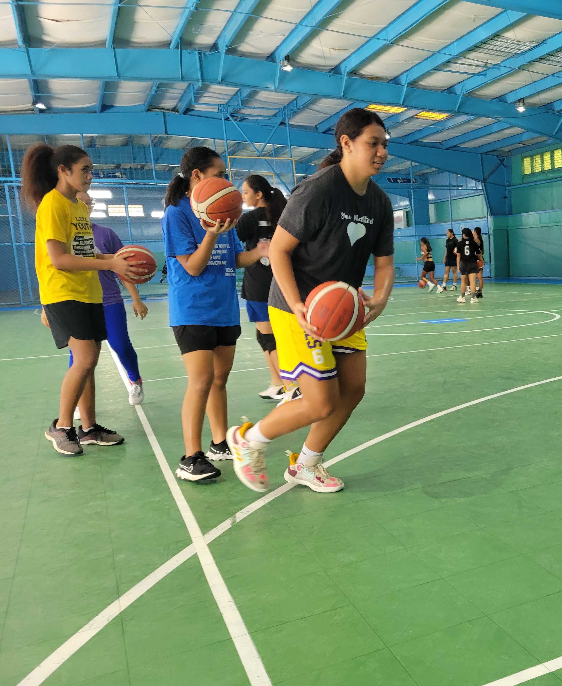 Azriel Fatialofa performs drills during a training session for the NMI U15 women’s pool on Saturday at the TSL Sports Complex, which will host the kick-off games in the women’s open division of the NMIBF Three vs Three Hoop Fest Tournament.